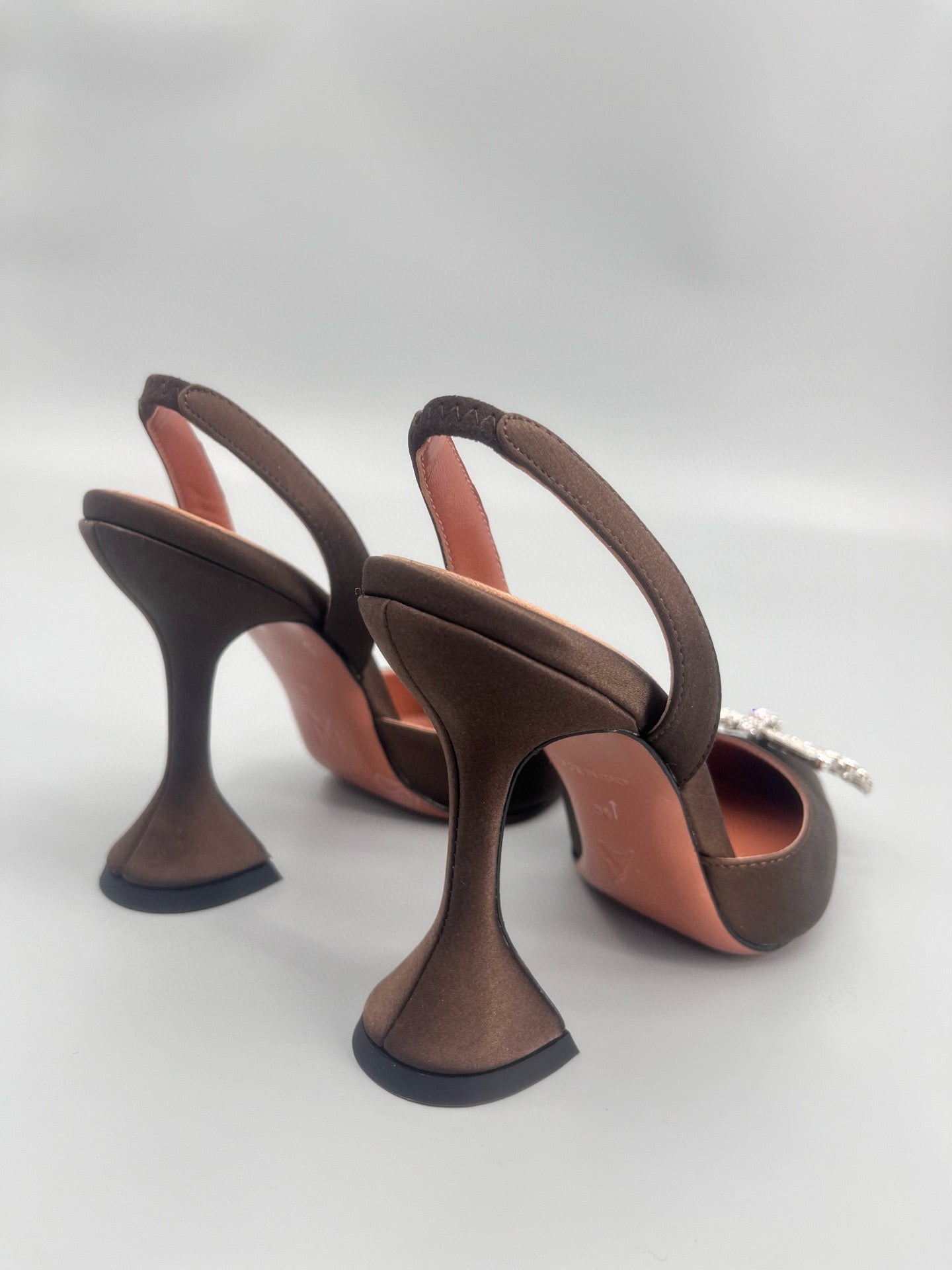 AMINA M HEELS