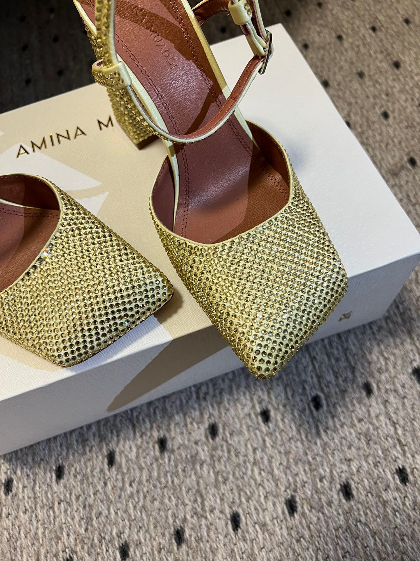 AMINA M HEELS