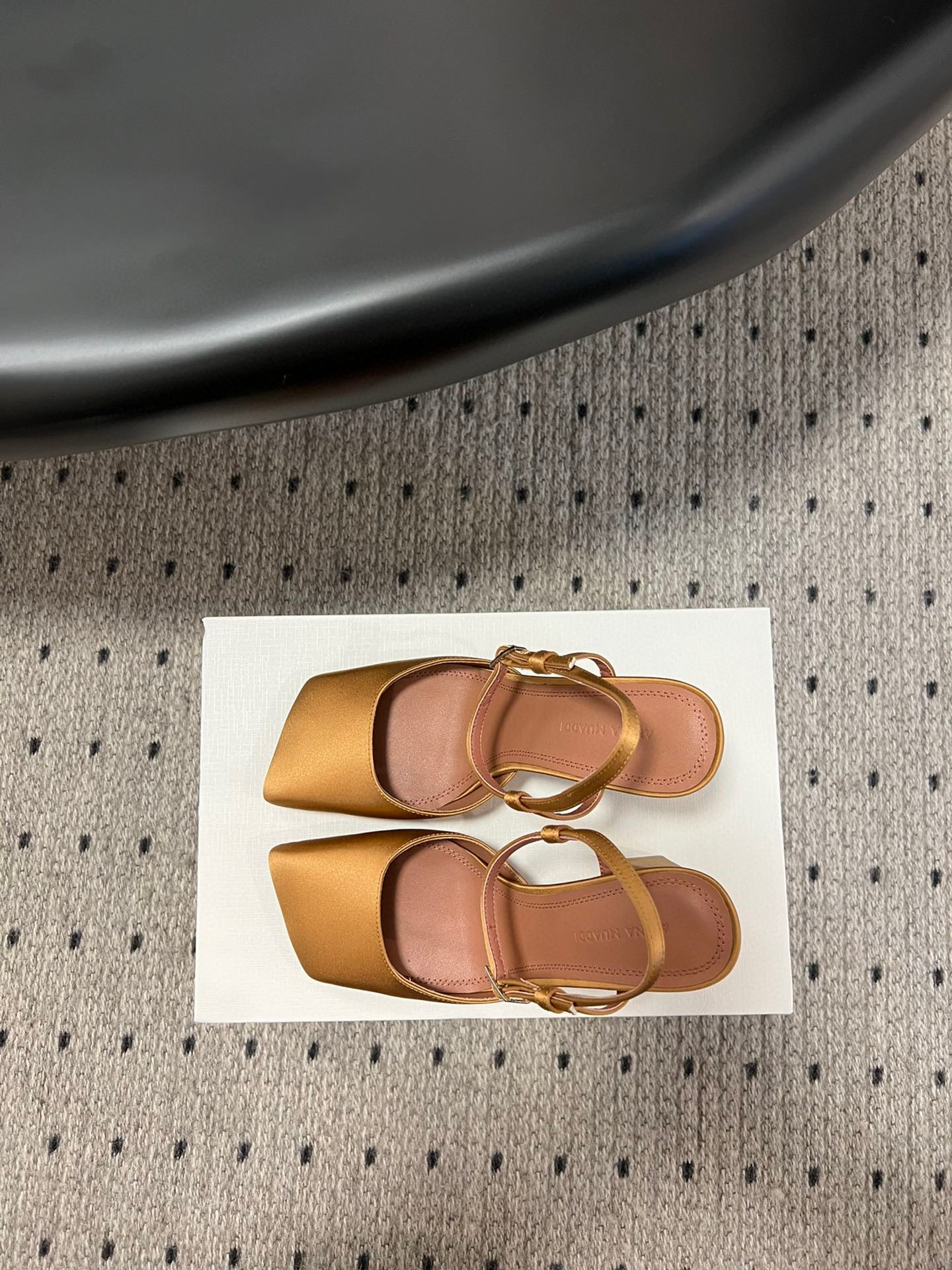 AMINA M HEELS