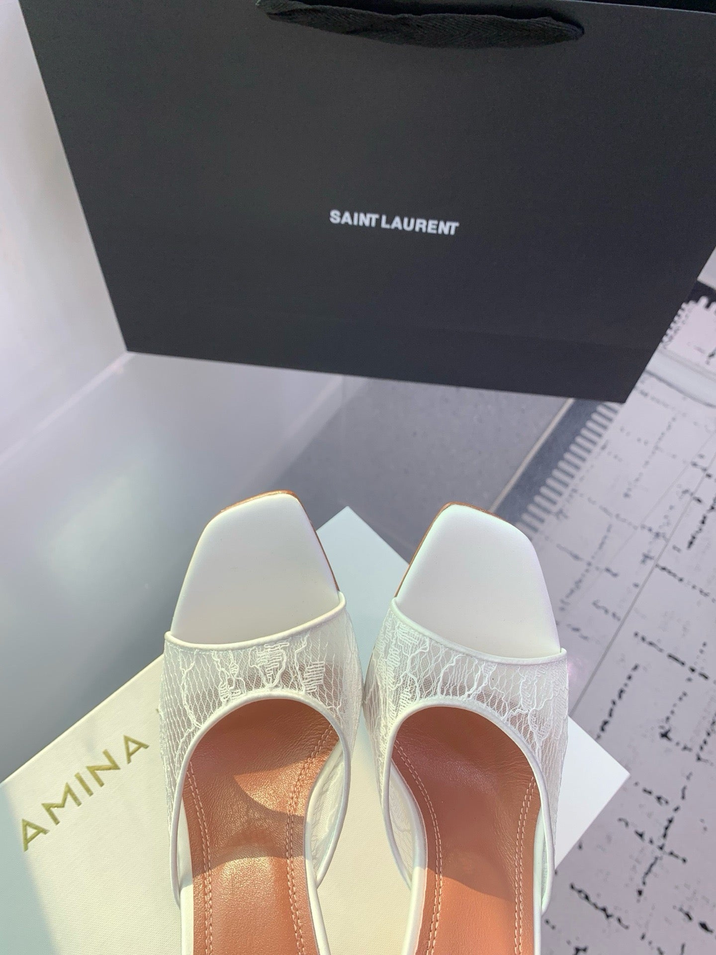 AMINA M HEELS