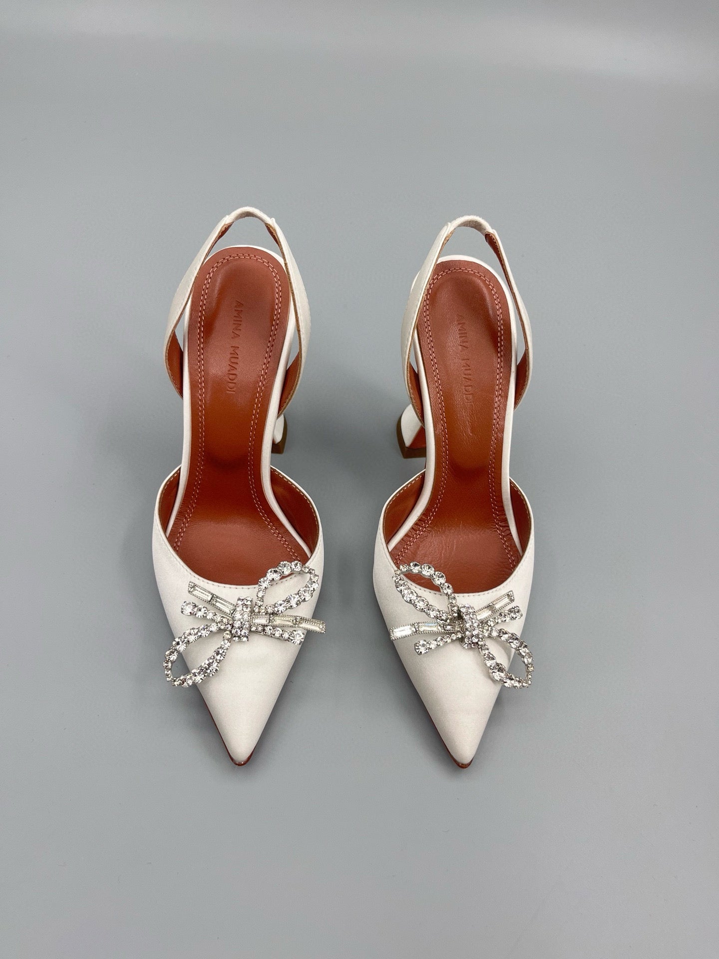 AMINA M HEELS