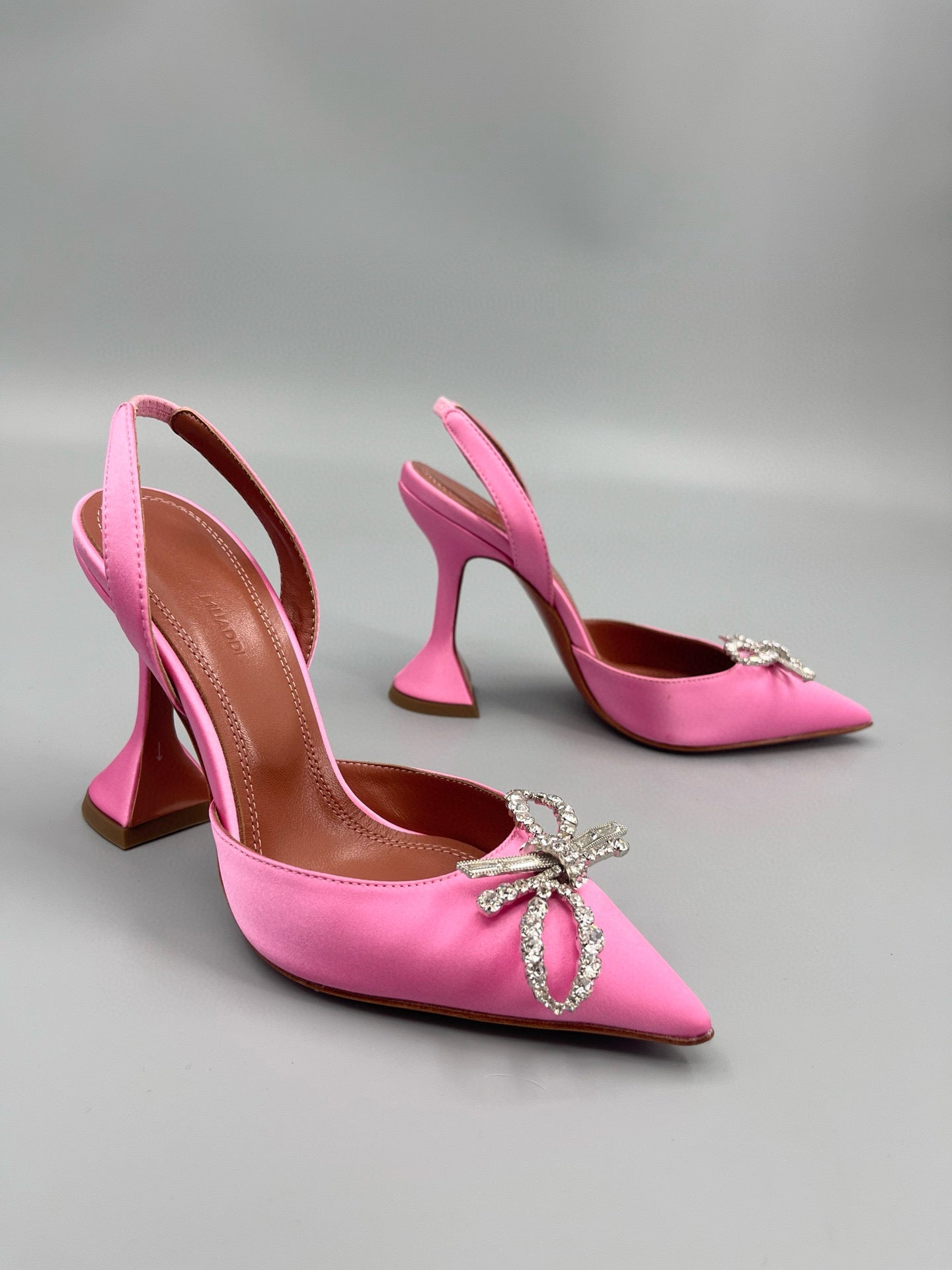 AMINA M HEELS