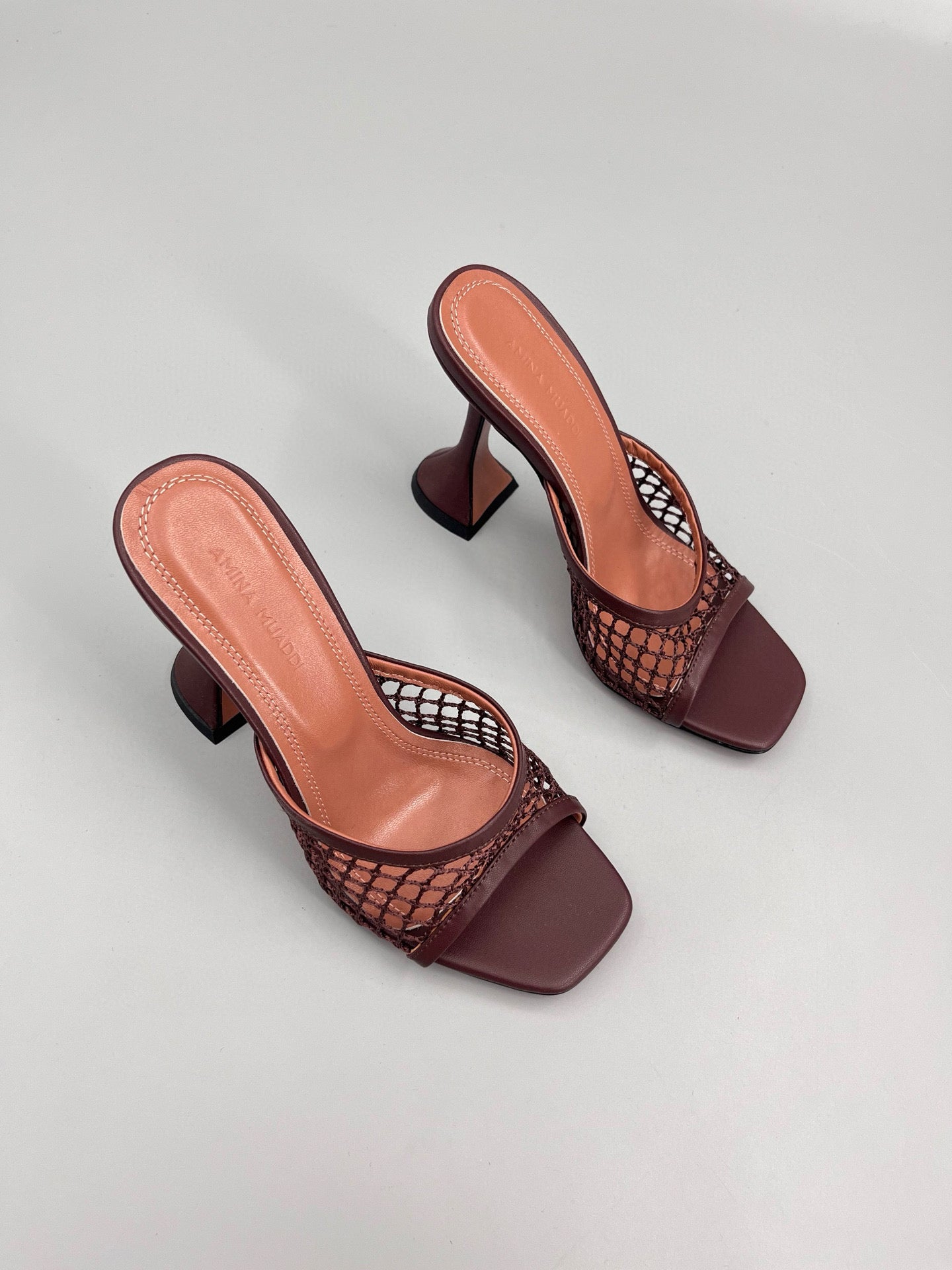 AMINA M HEELS
