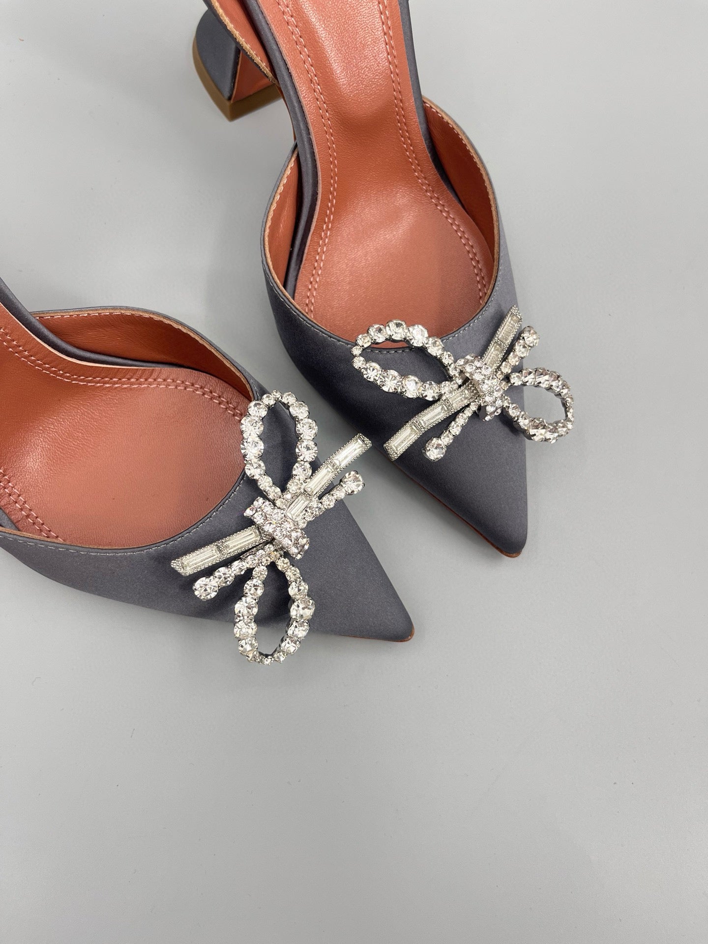AMINA M HEELS
