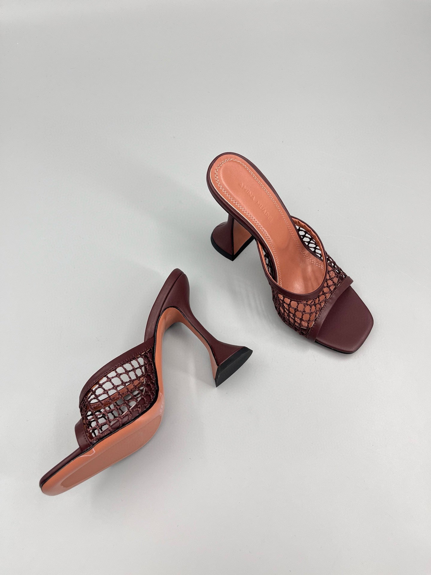 AMINA M HEELS