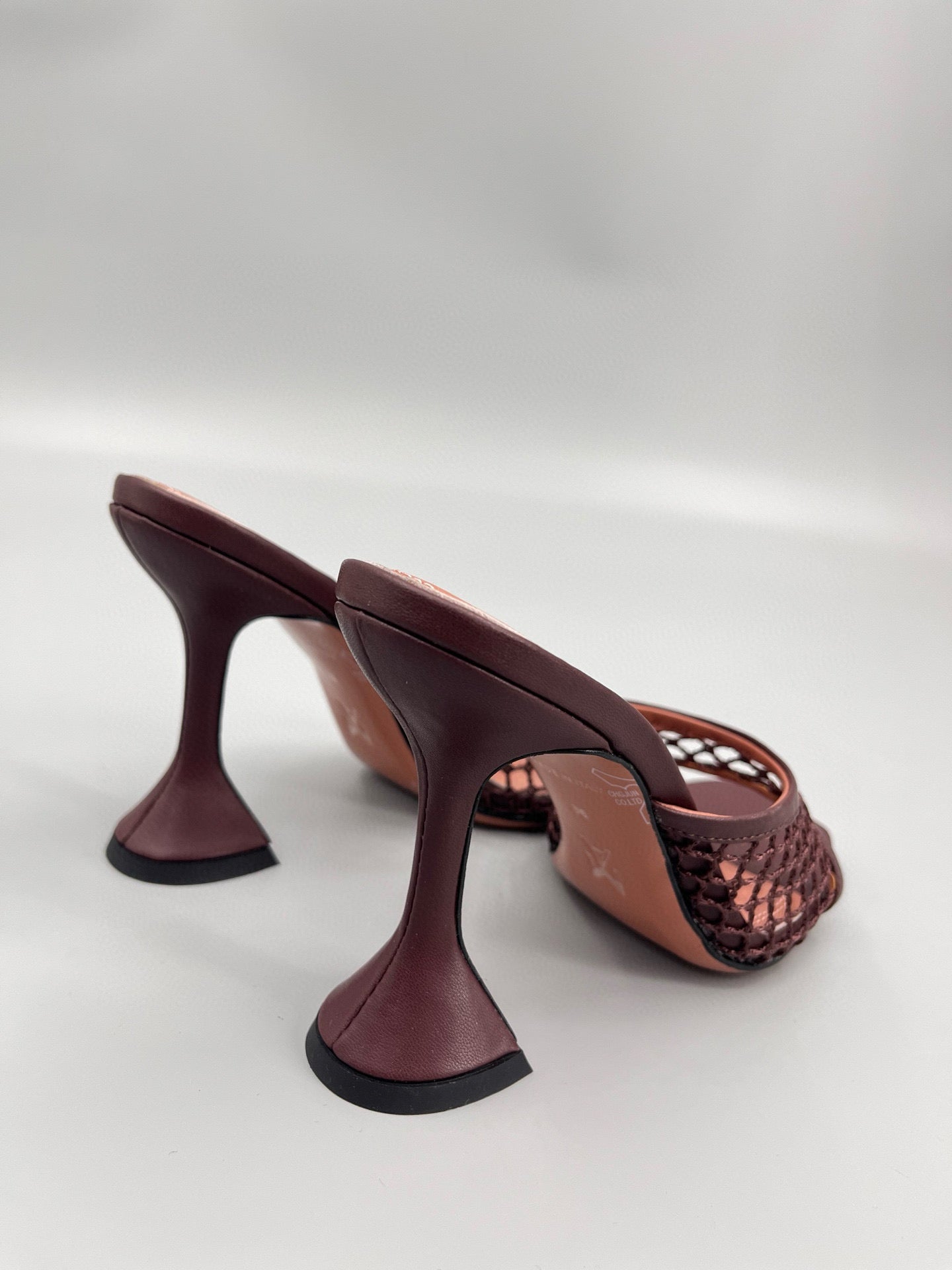 AMINA M HEELS