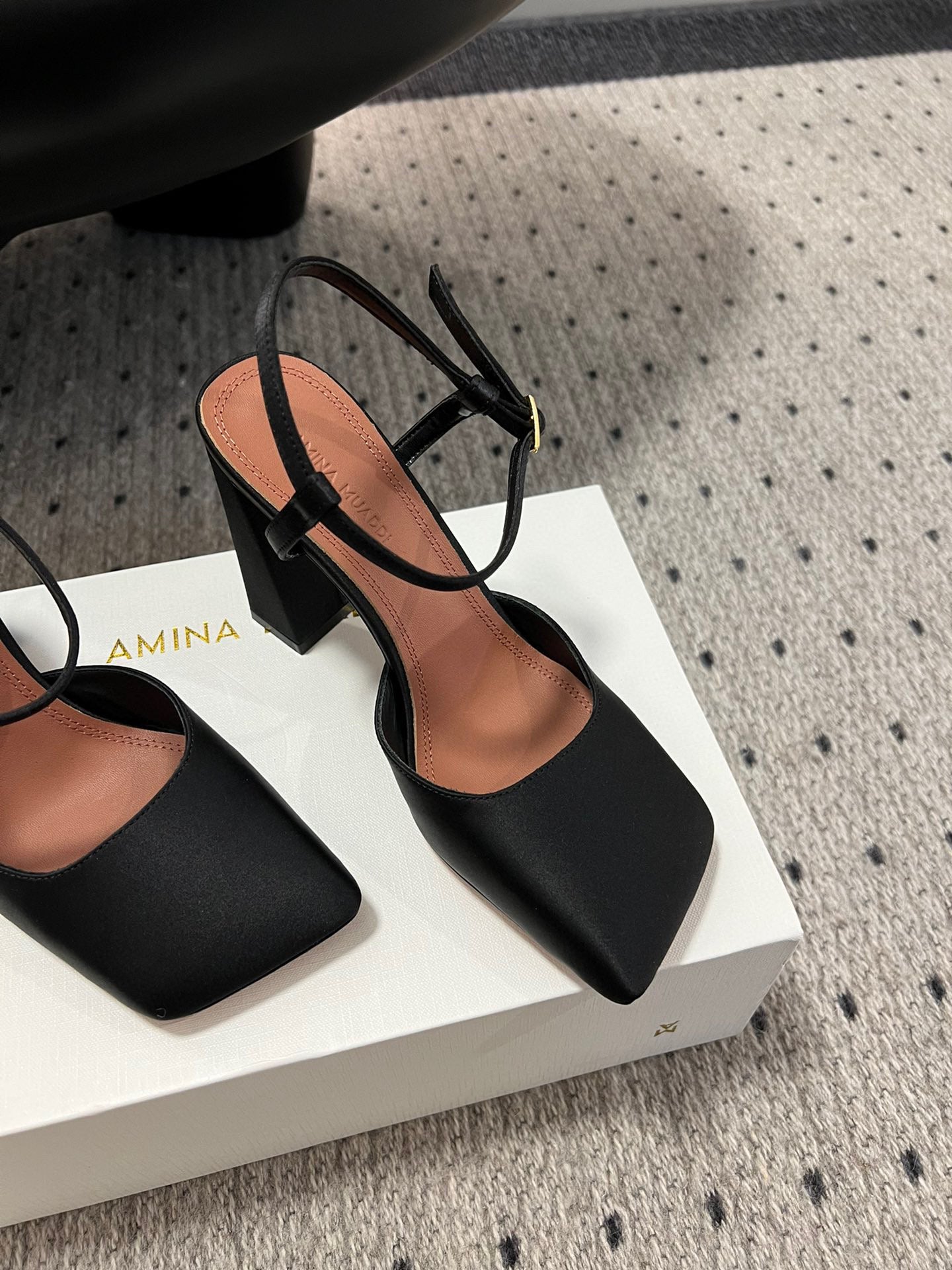 AMINA M HEELS