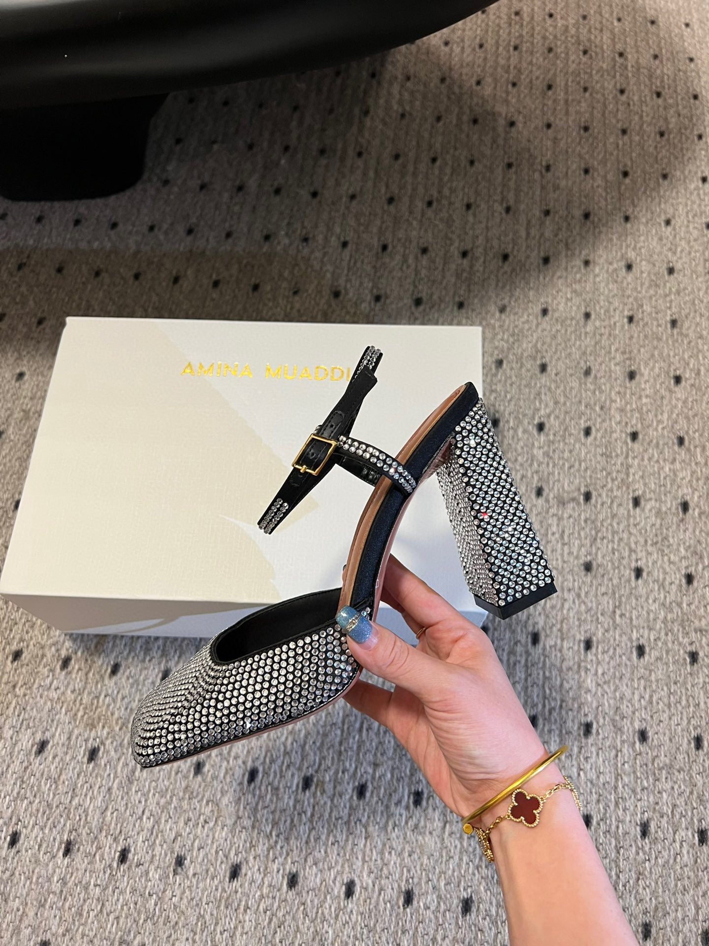 AMINA M HEELS