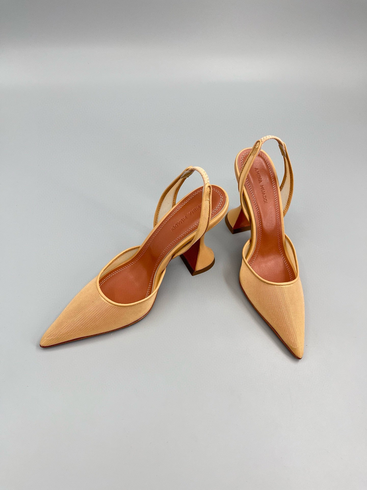 AMINA M HEELS