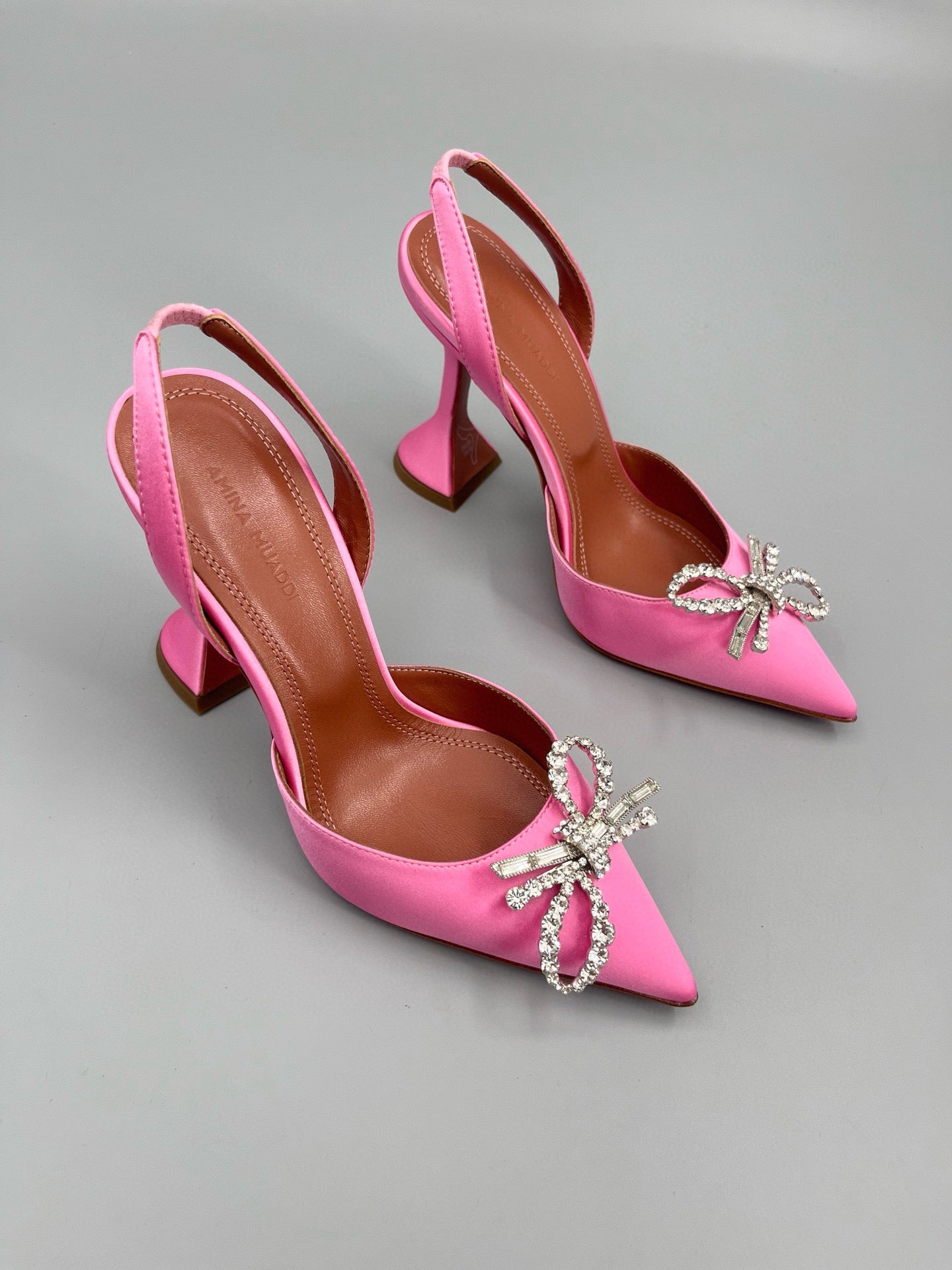 AMINA M HEELS