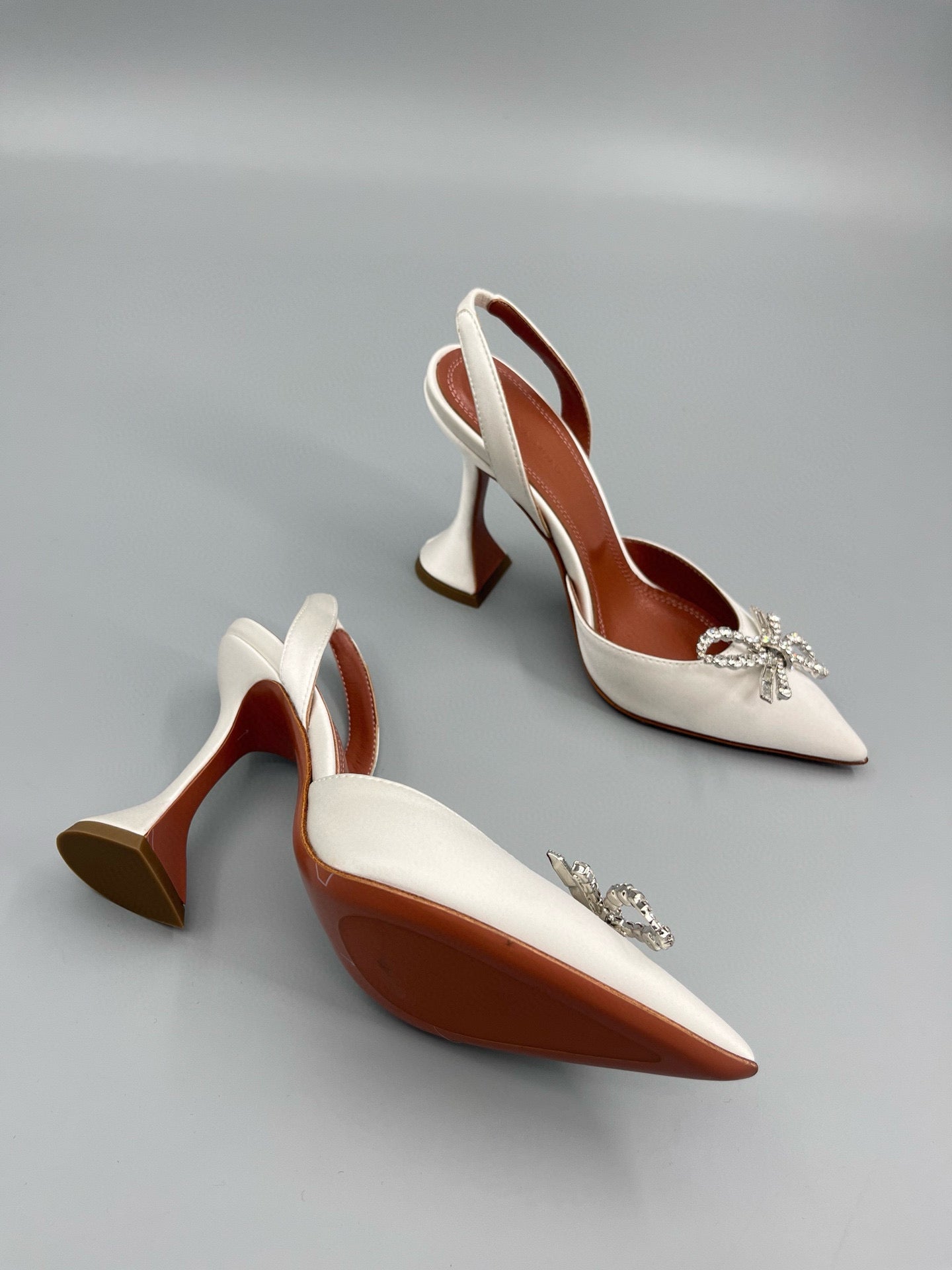 AMINA M HEELS