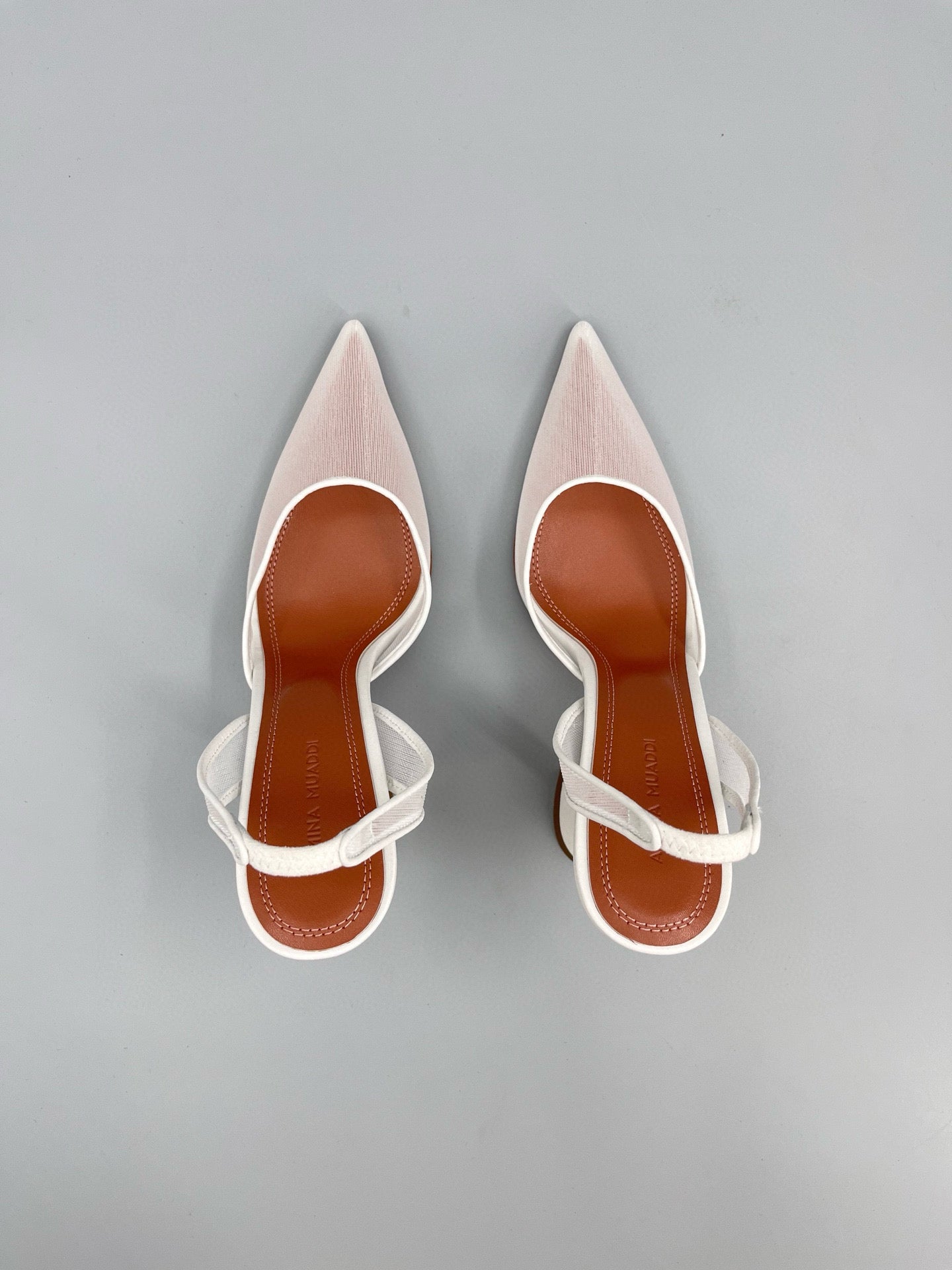 AMINA M HEELS