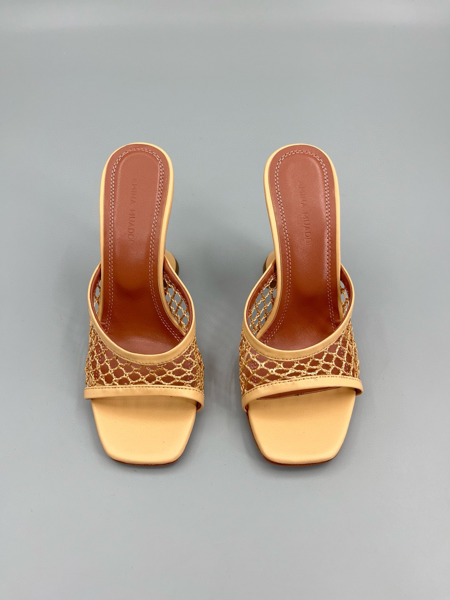 AMINA M HEELS