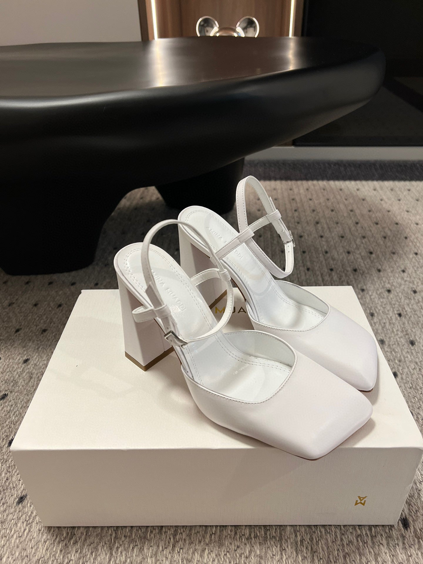 AMINA M HEELS