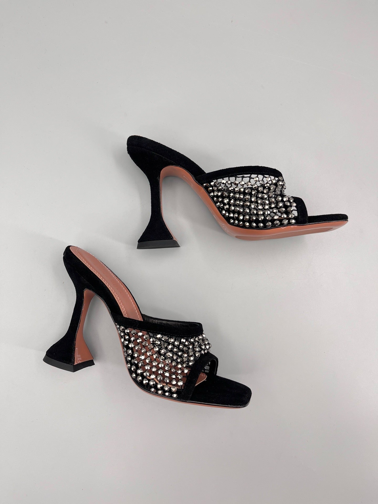 AMINA M HEELS