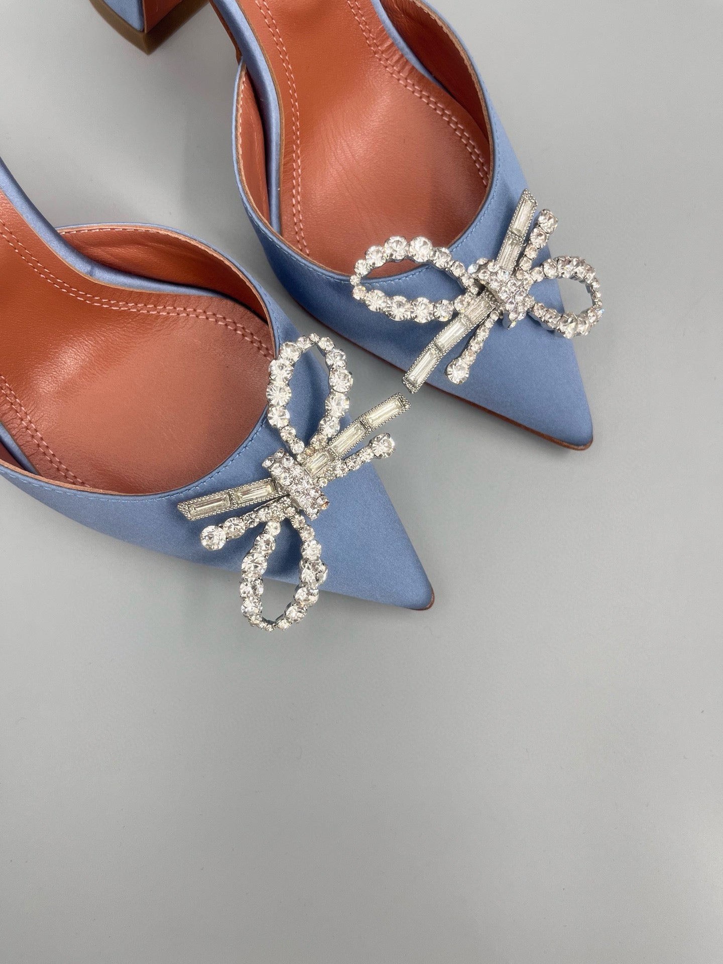 AMINA M HEELS