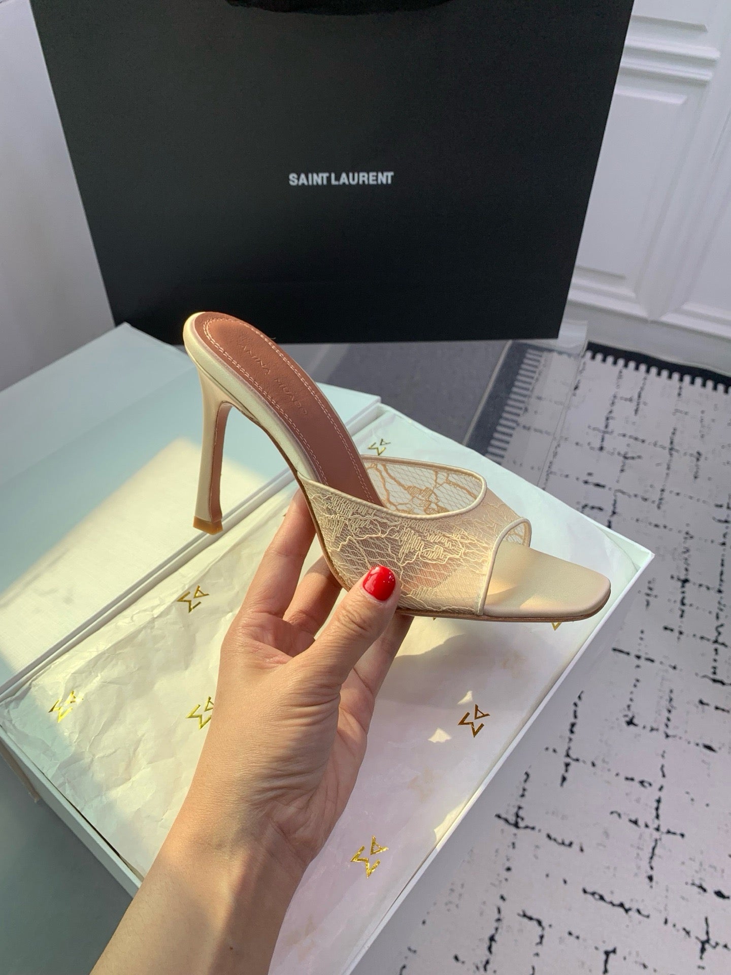 AMINA M HEELS