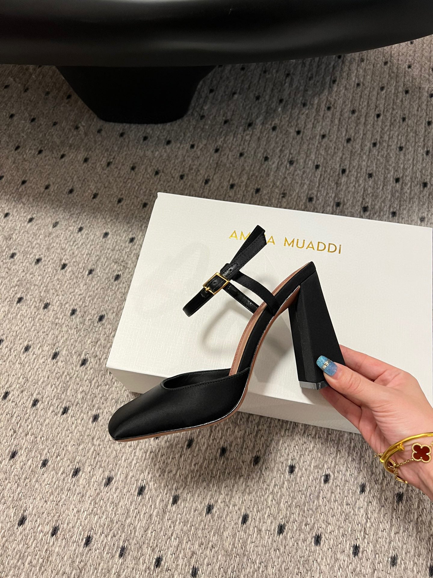 AMINA M HEELS