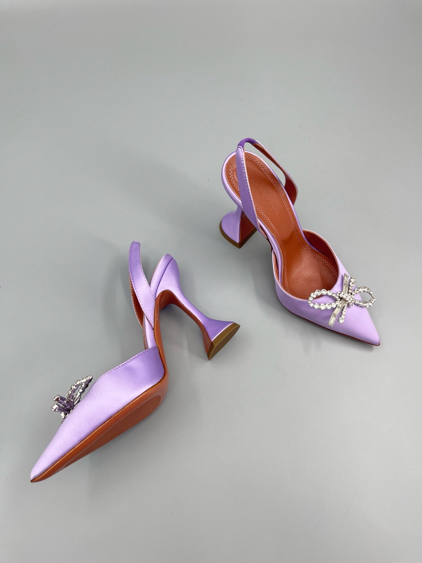 AMINA M HEELS