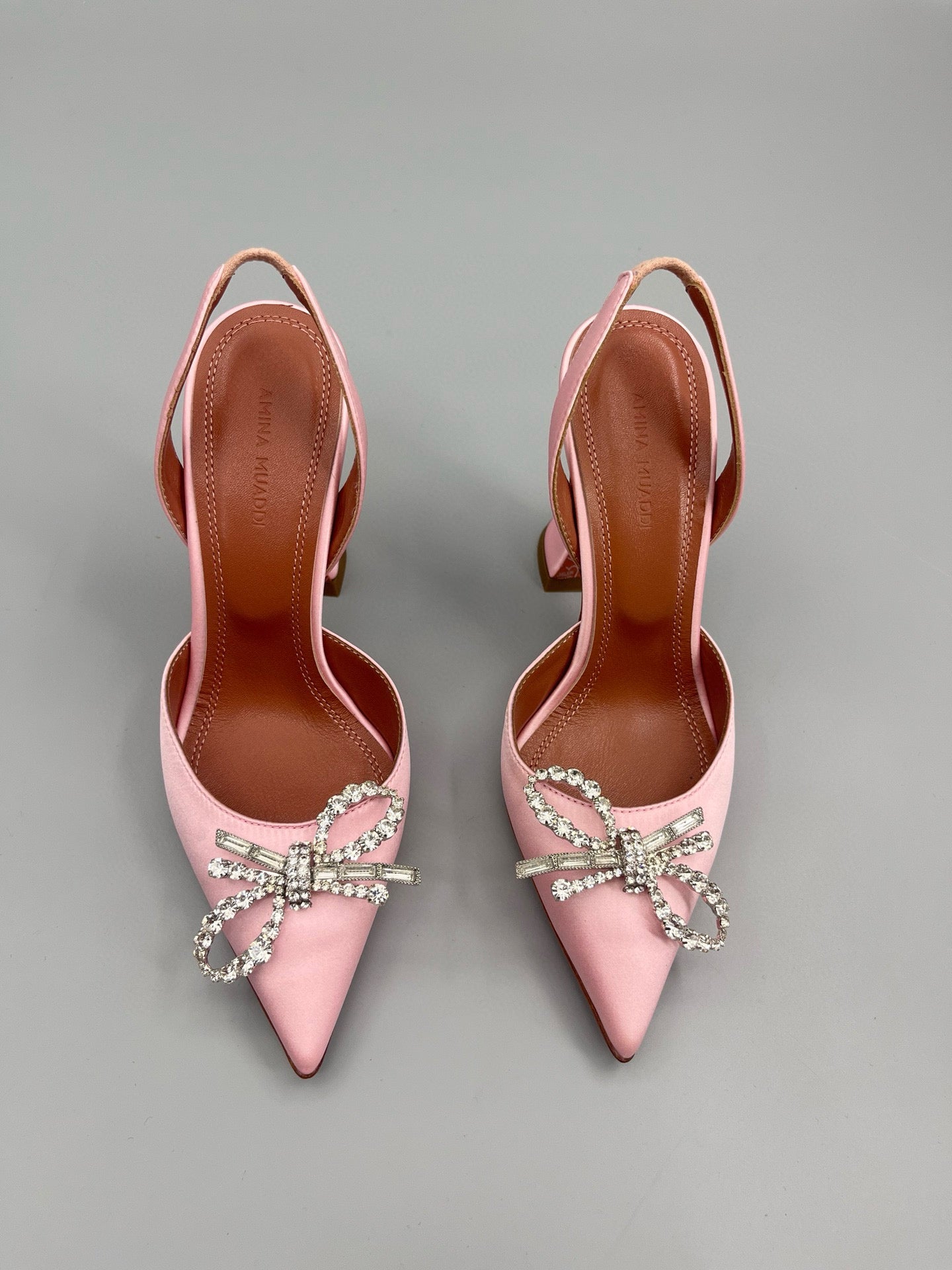 AMINA M HEELS