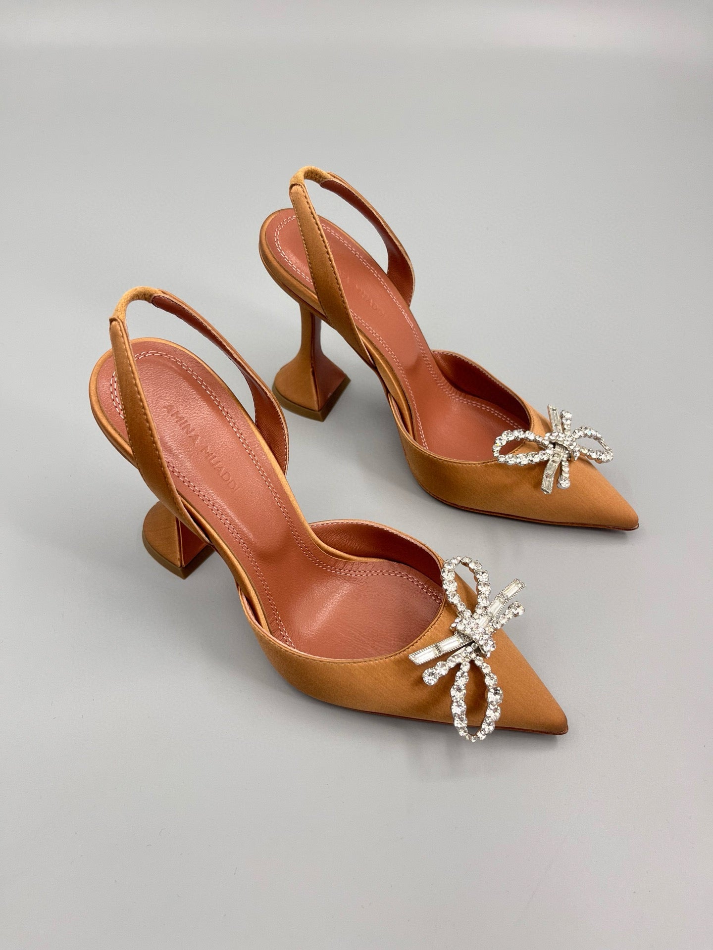 AMINA M HEELS