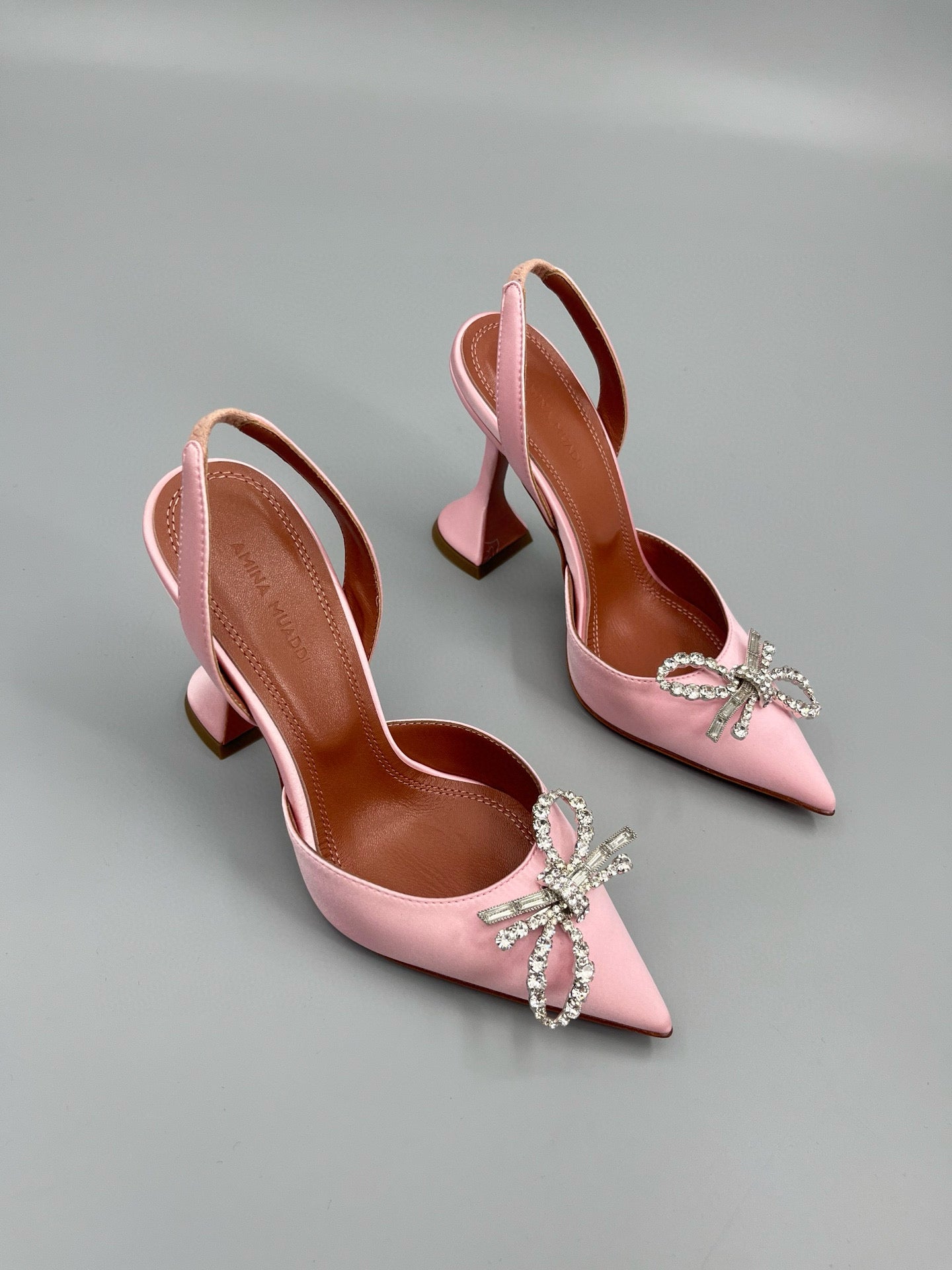 AMINA M HEELS