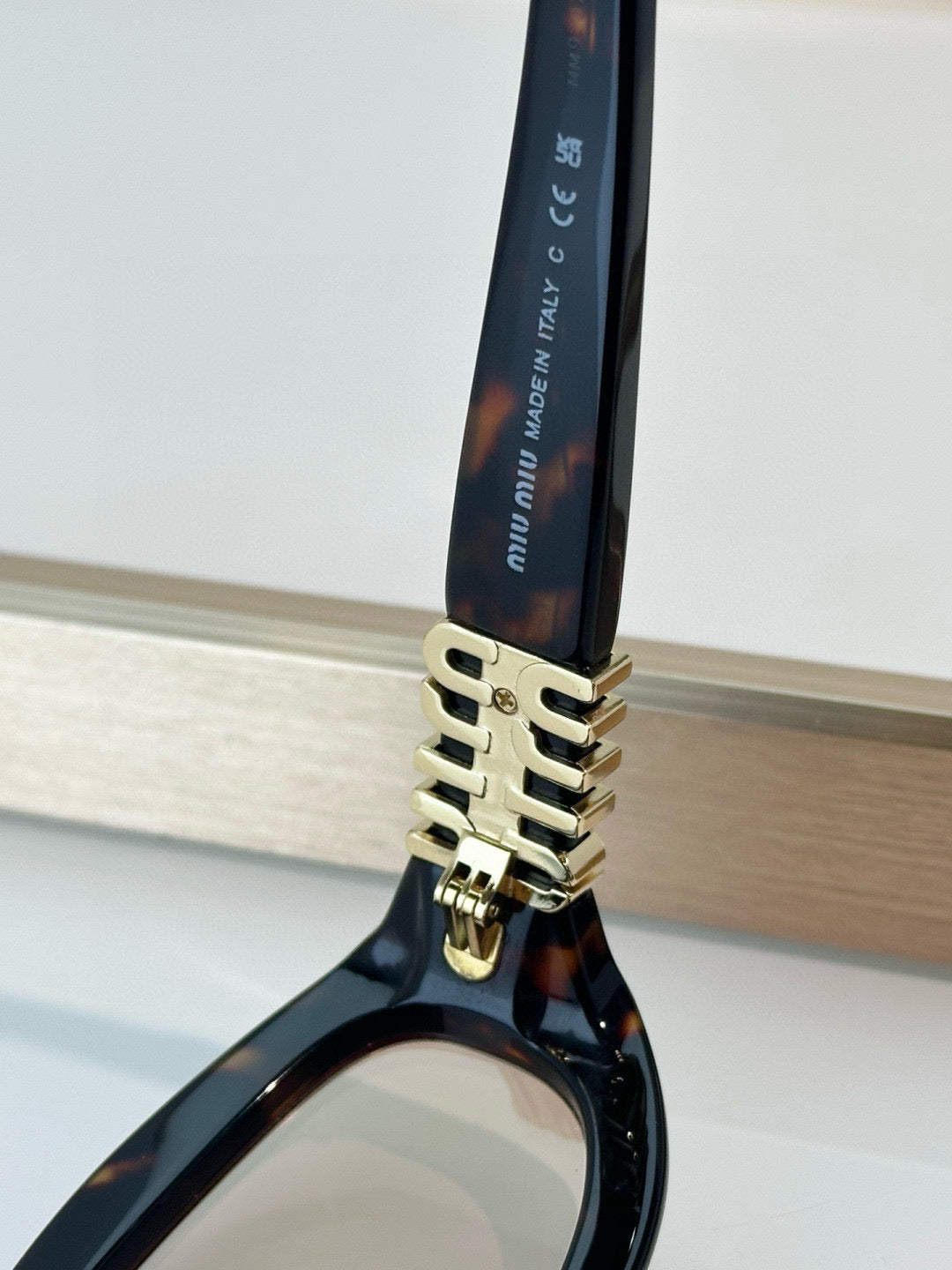 MIU M SUNGLASSES