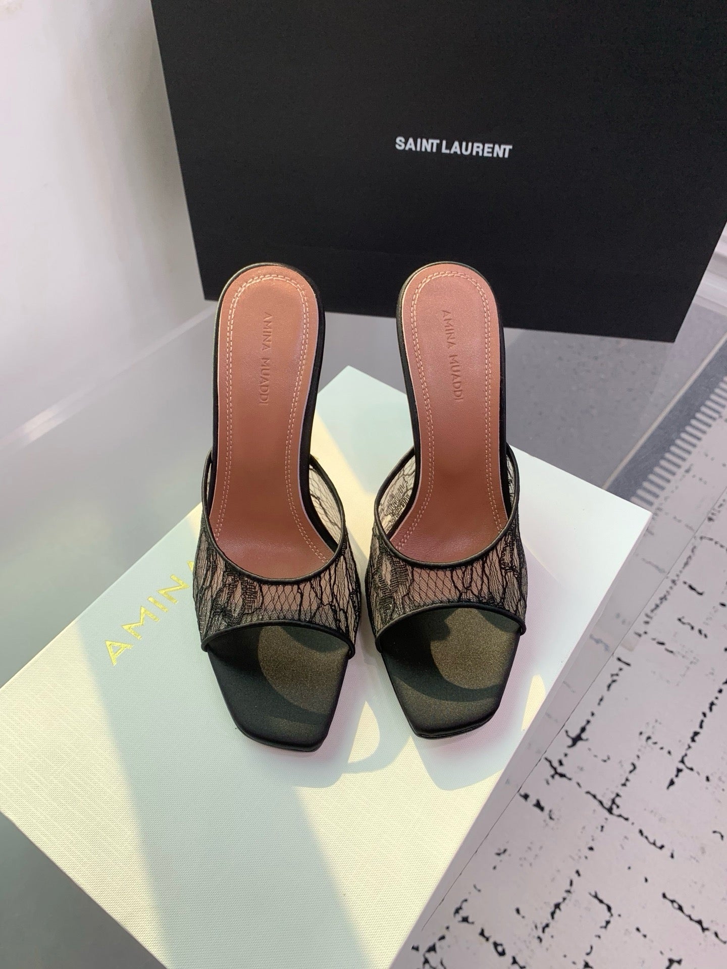 AMINA M HEELS