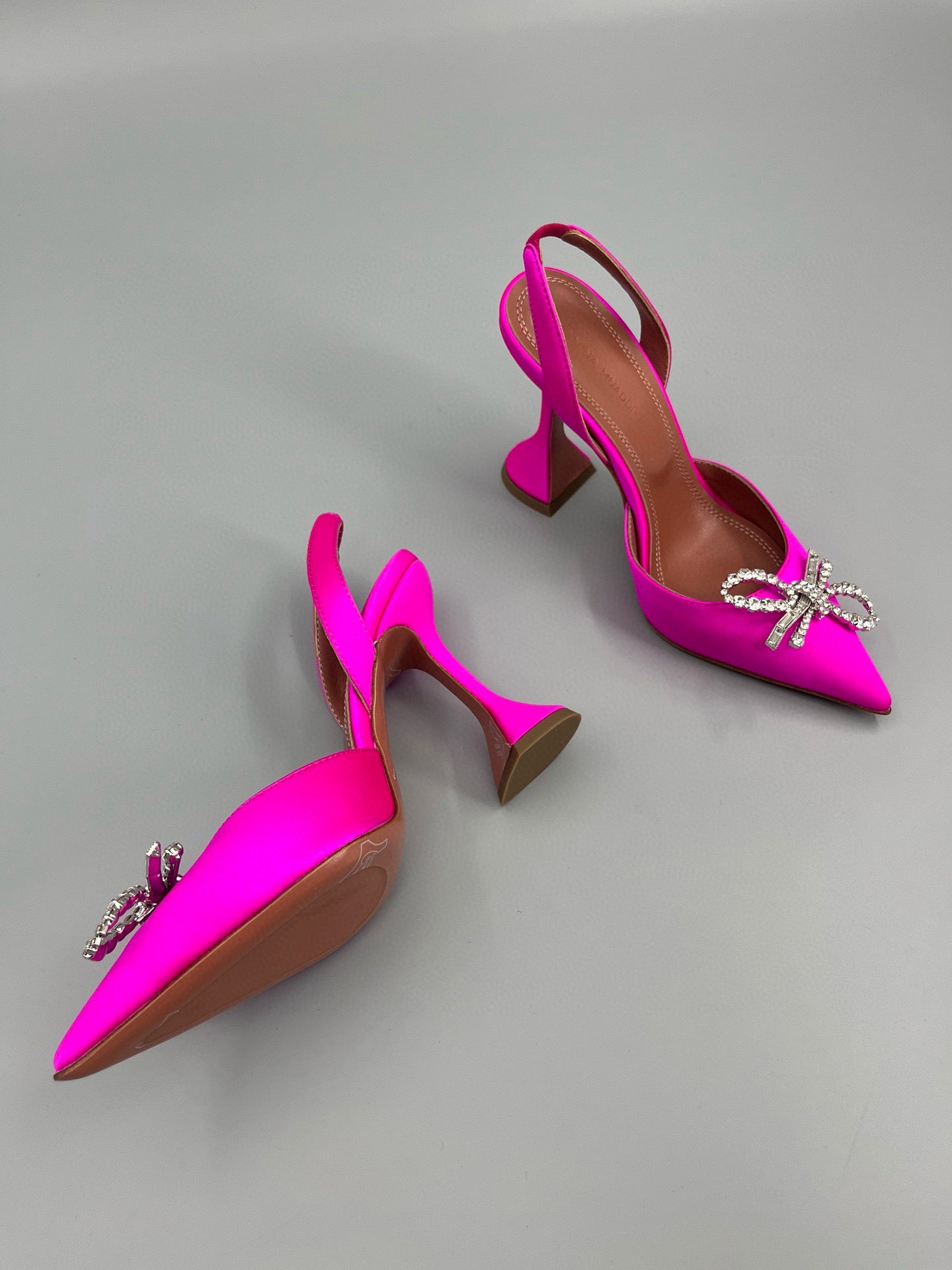 AMINA M HEELS