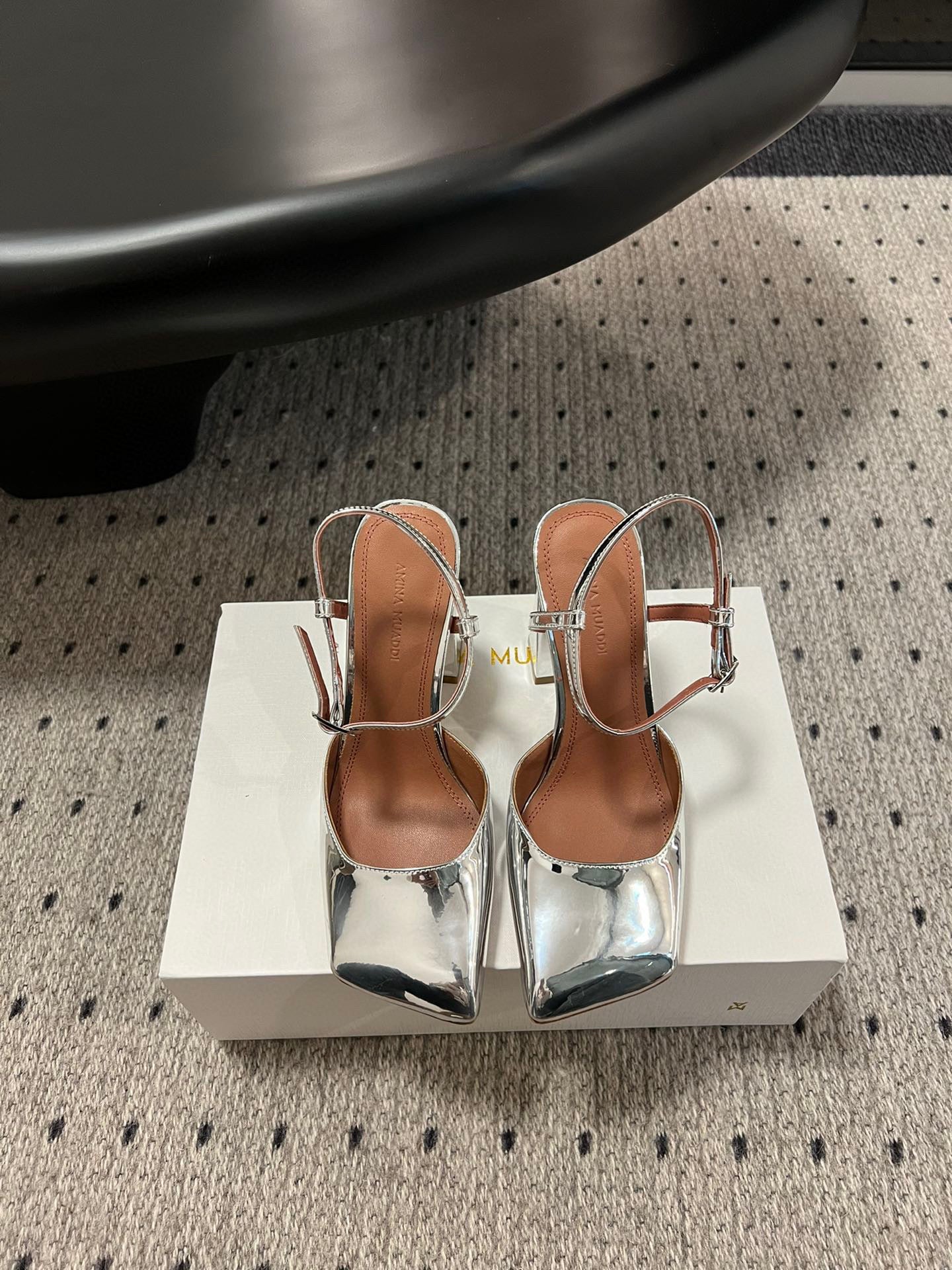 AMINA M HEELS