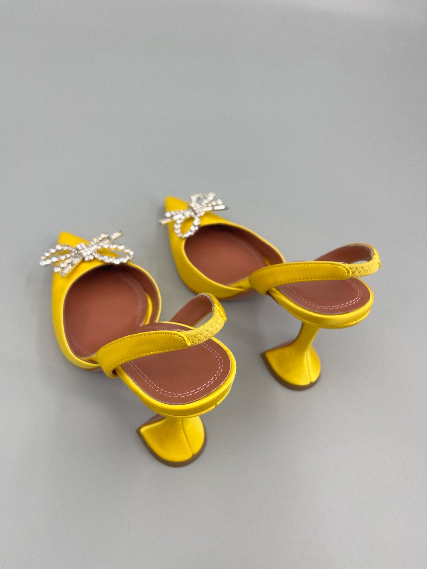 AMINA M HEELS