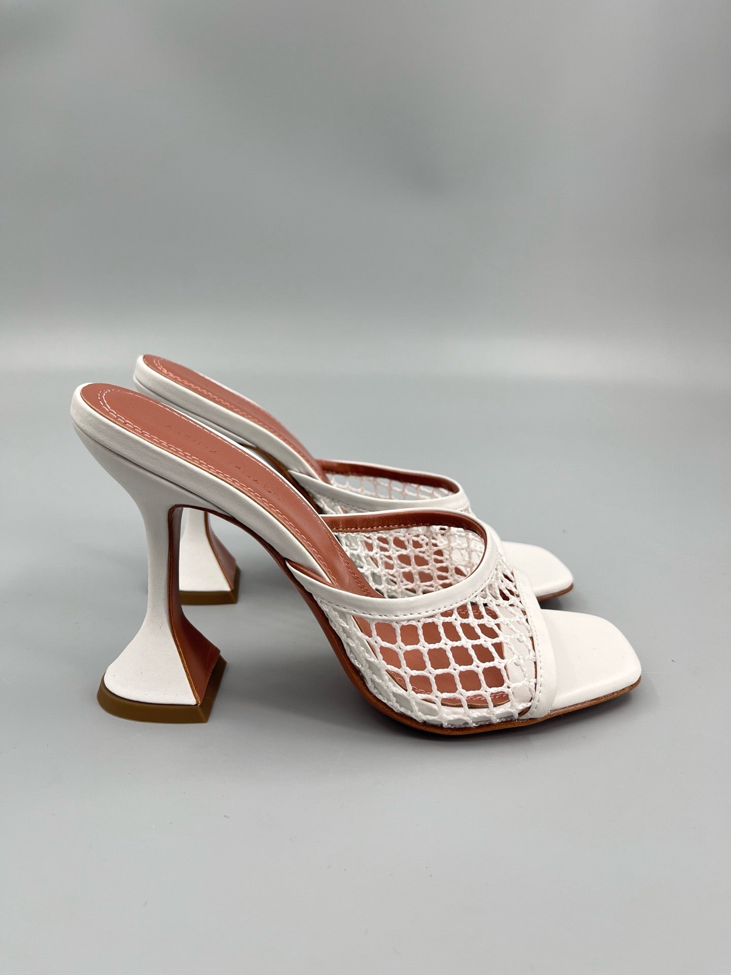 AMINA M HEELS