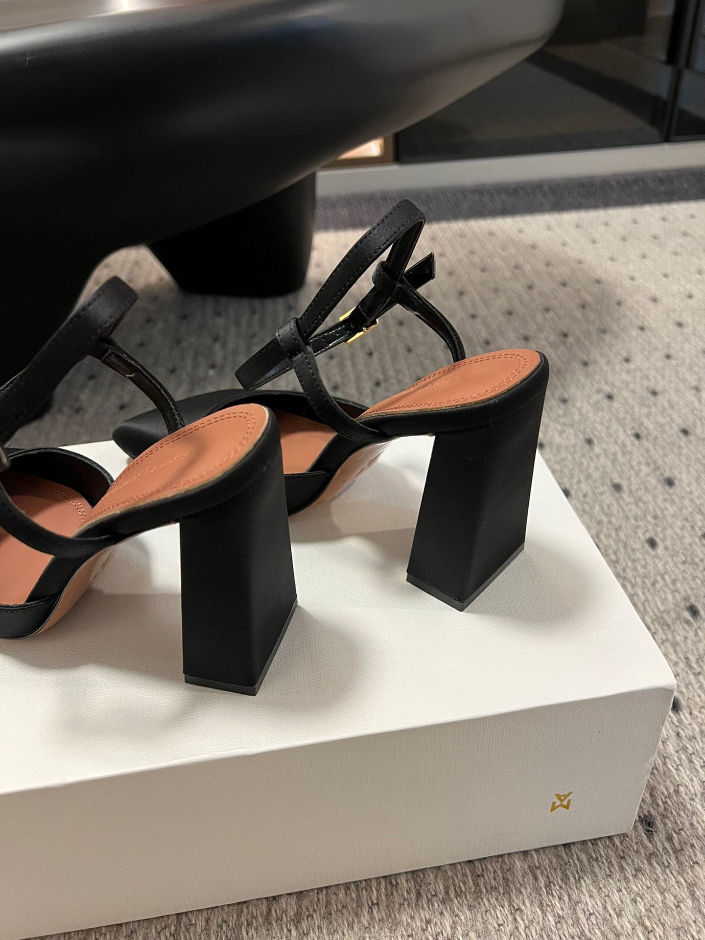 AMINA M HEELS