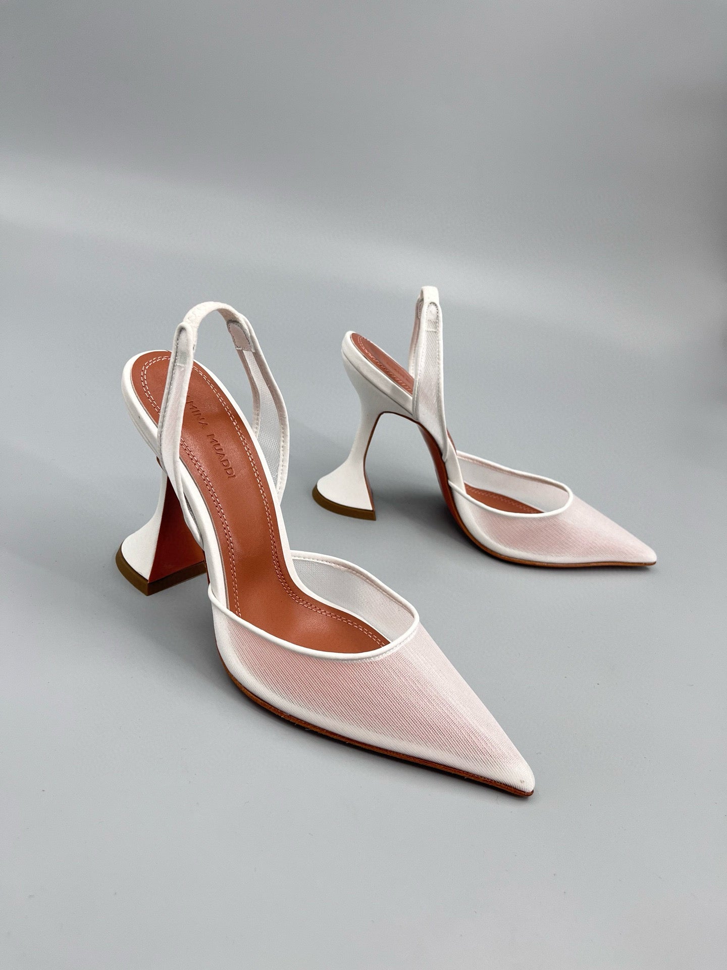 AMINA M HEELS