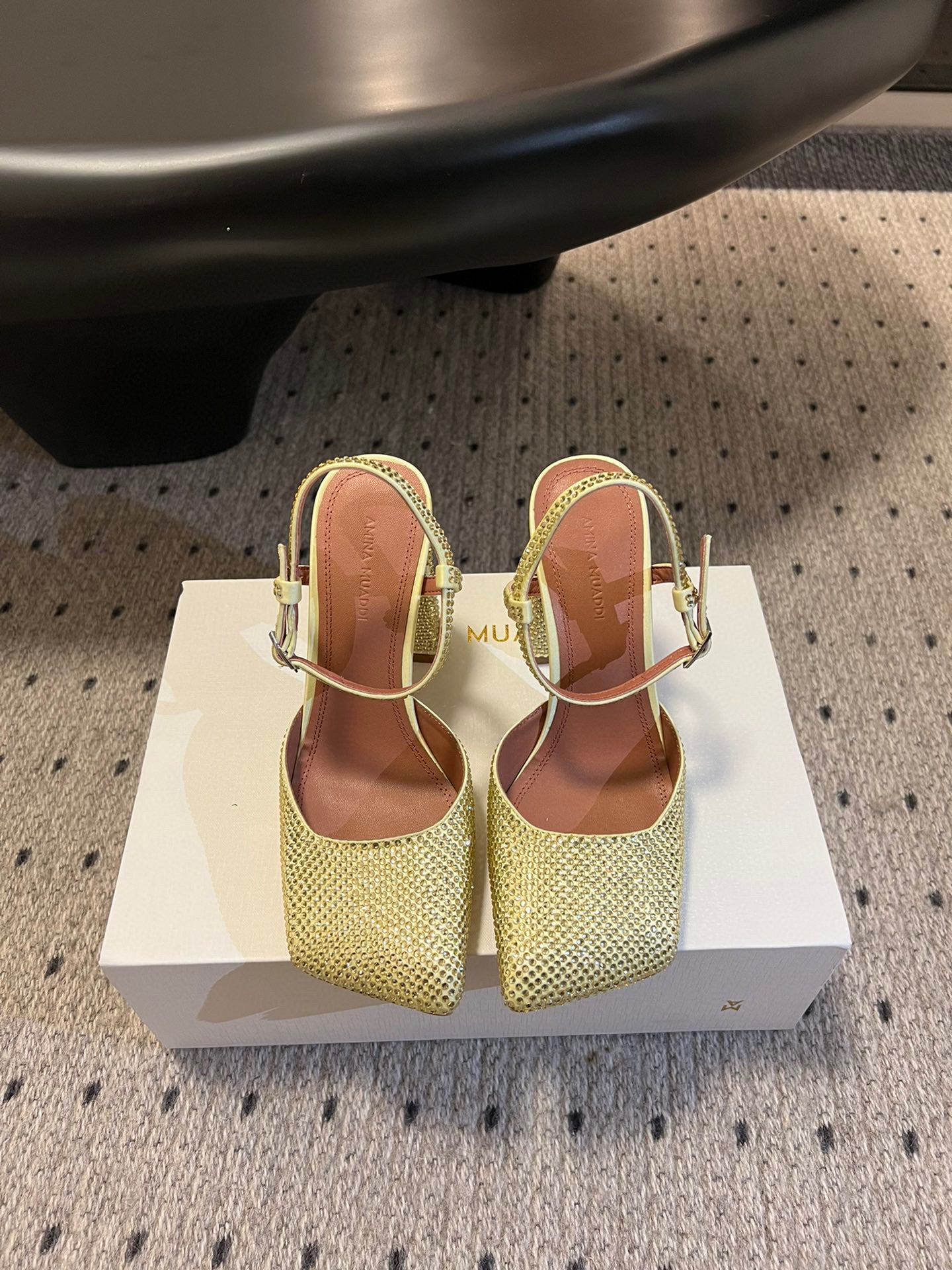 AMINA M HEELS