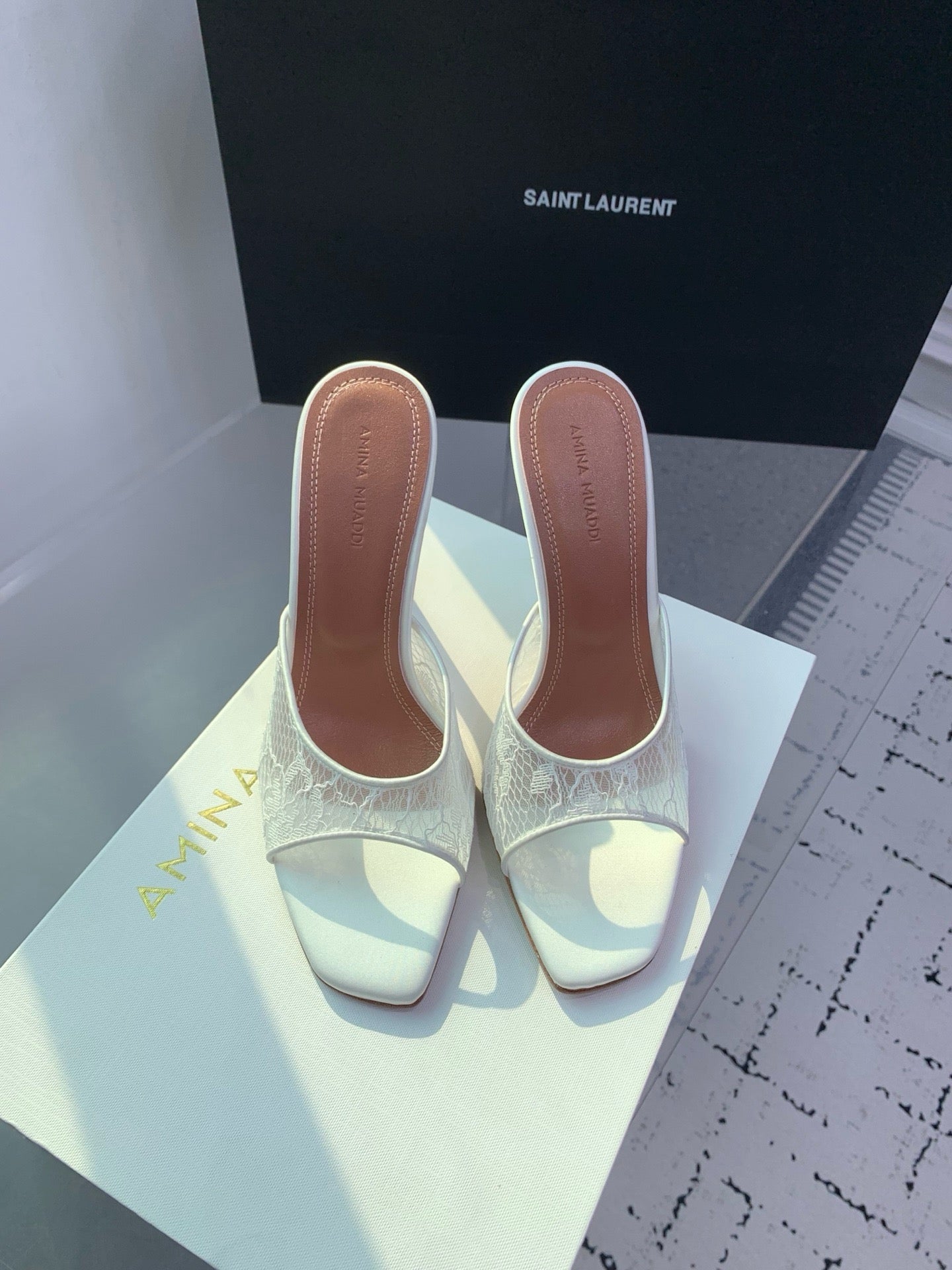 AMINA M HEELS