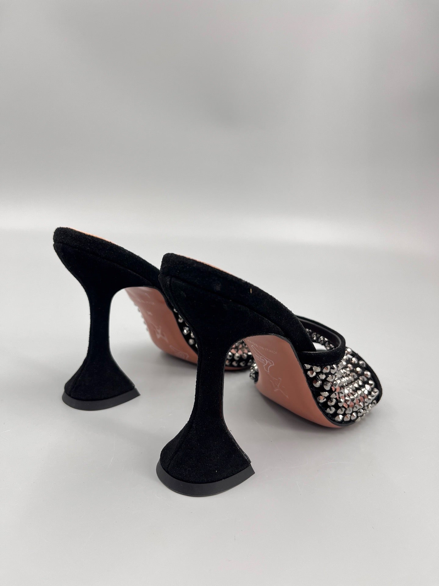 AMINA M HEELS