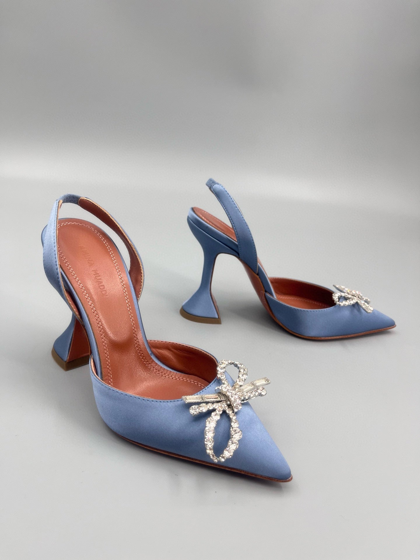 AMINA M HEELS