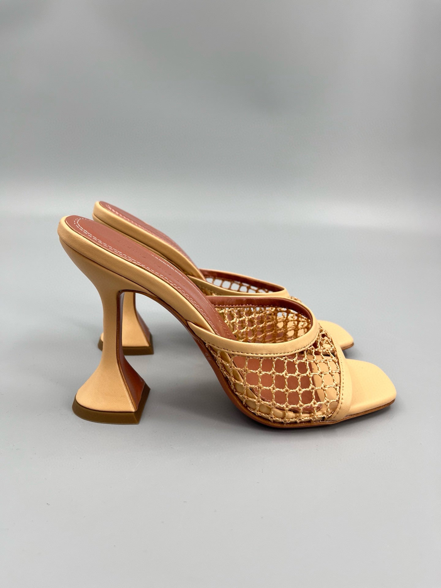 AMINA M HEELS