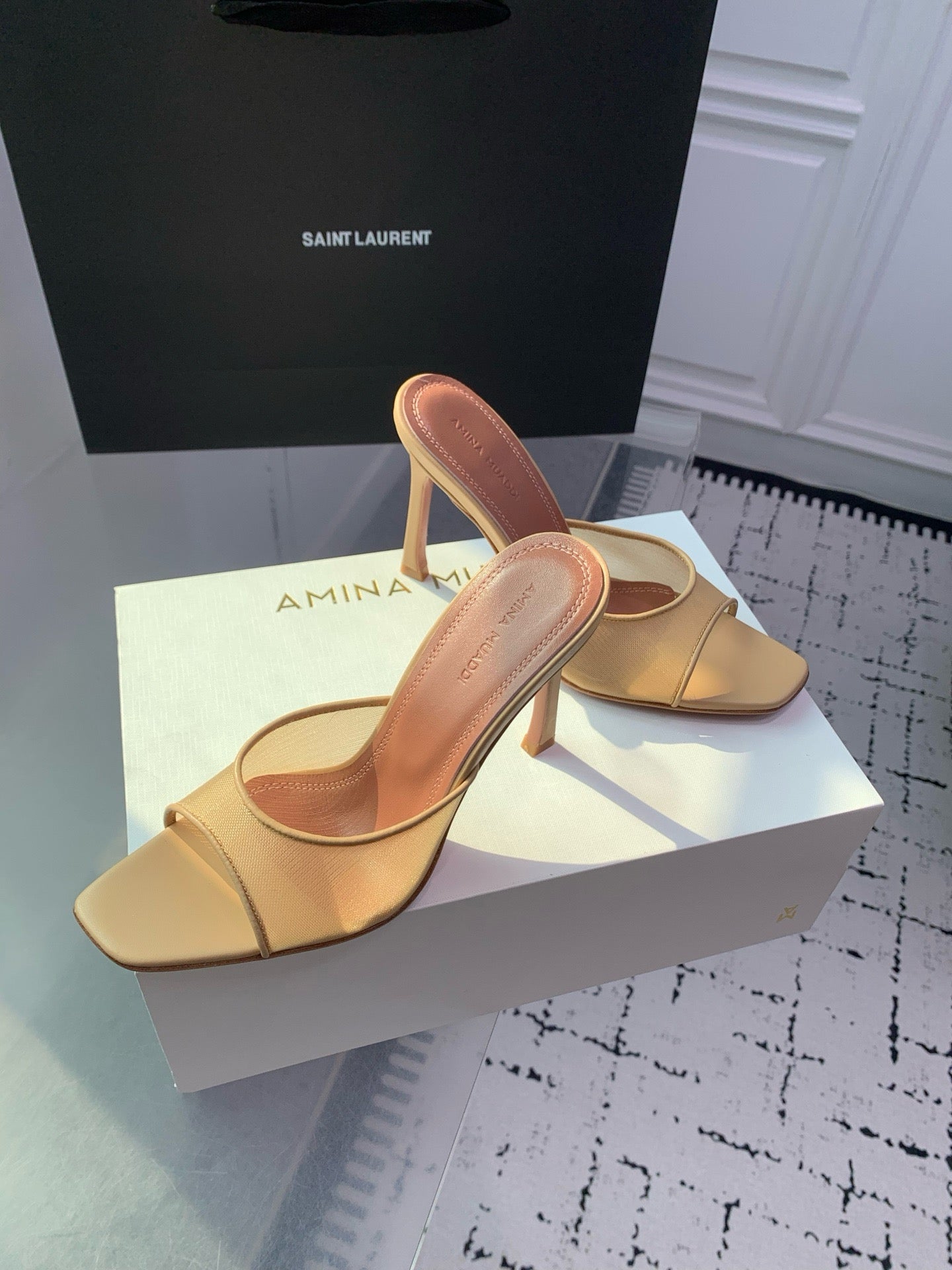 AMINA M HEELS