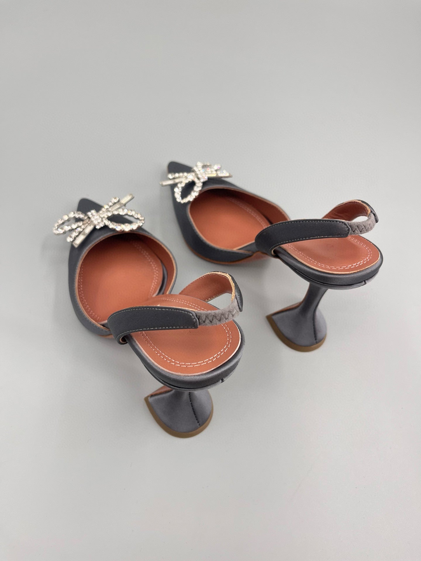 AMINA M HEELS