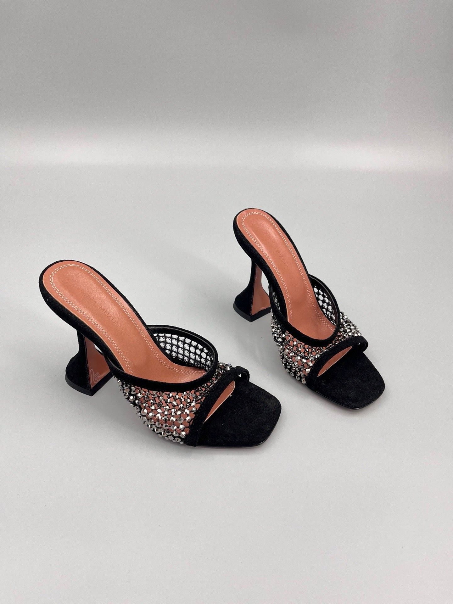 AMINA M HEELS