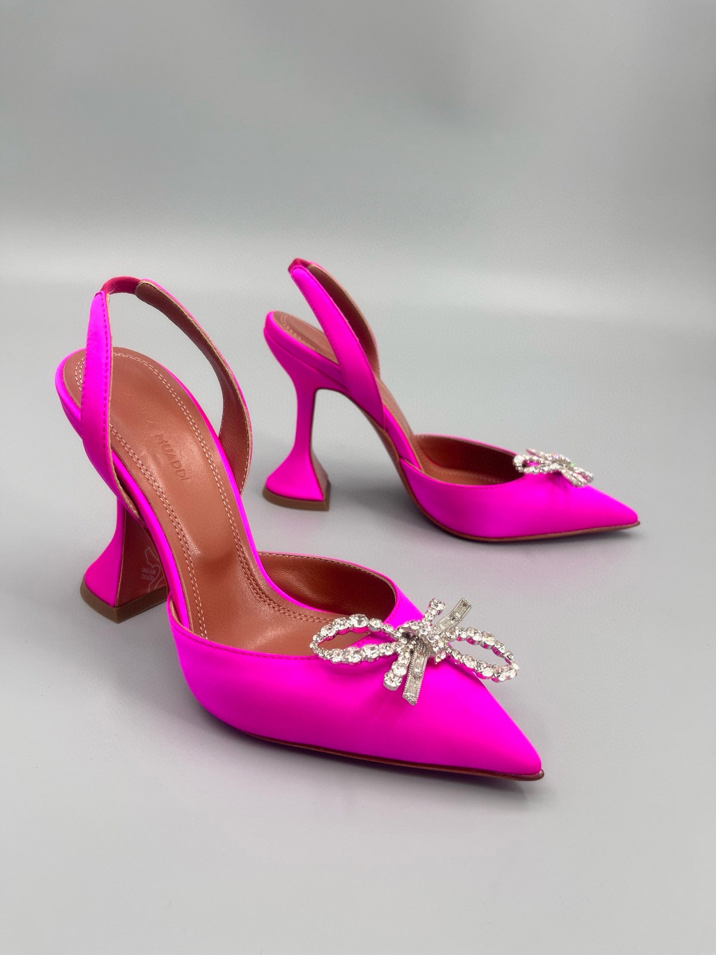 AMINA M HEELS