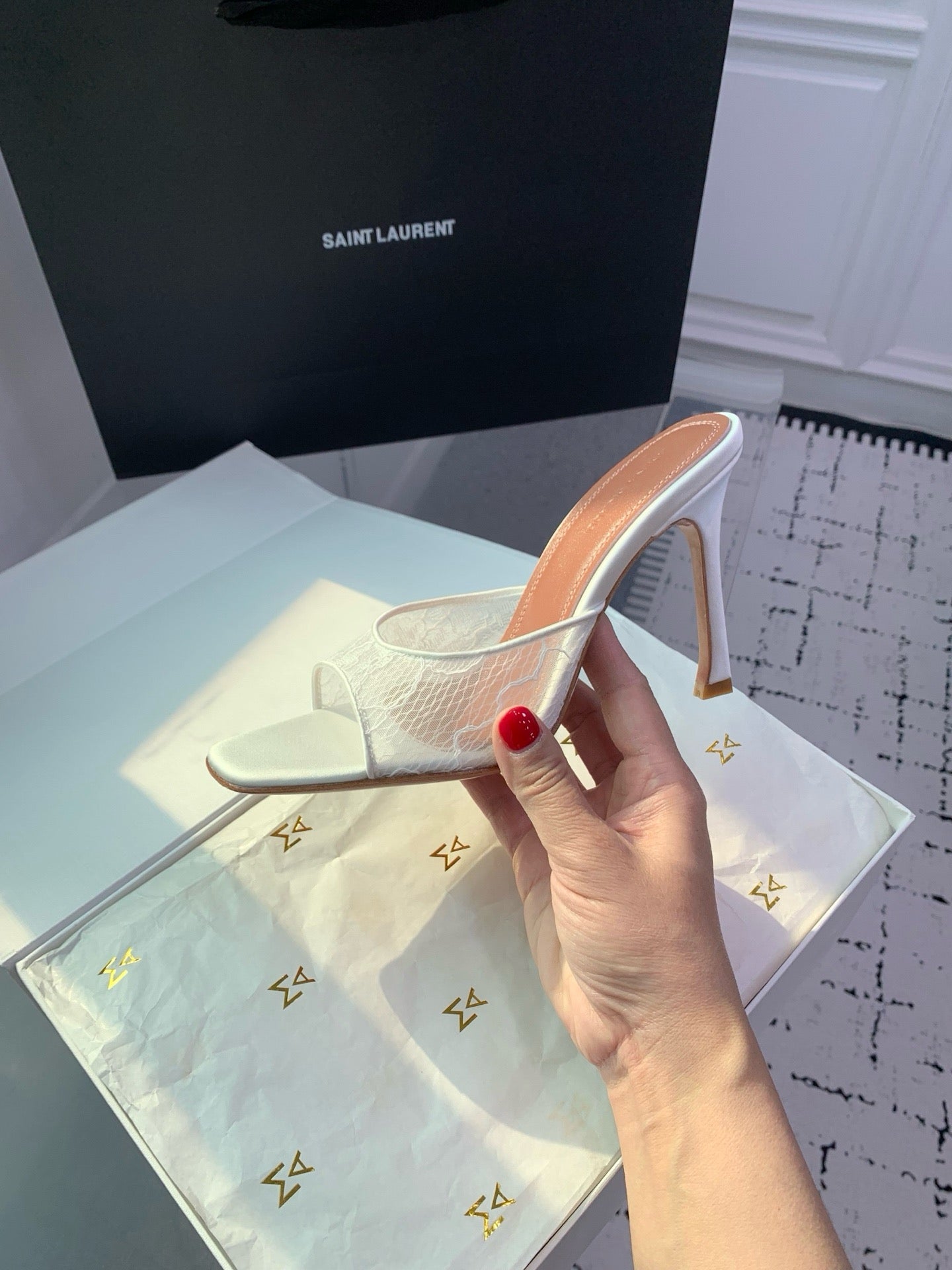 AMINA M HEELS
