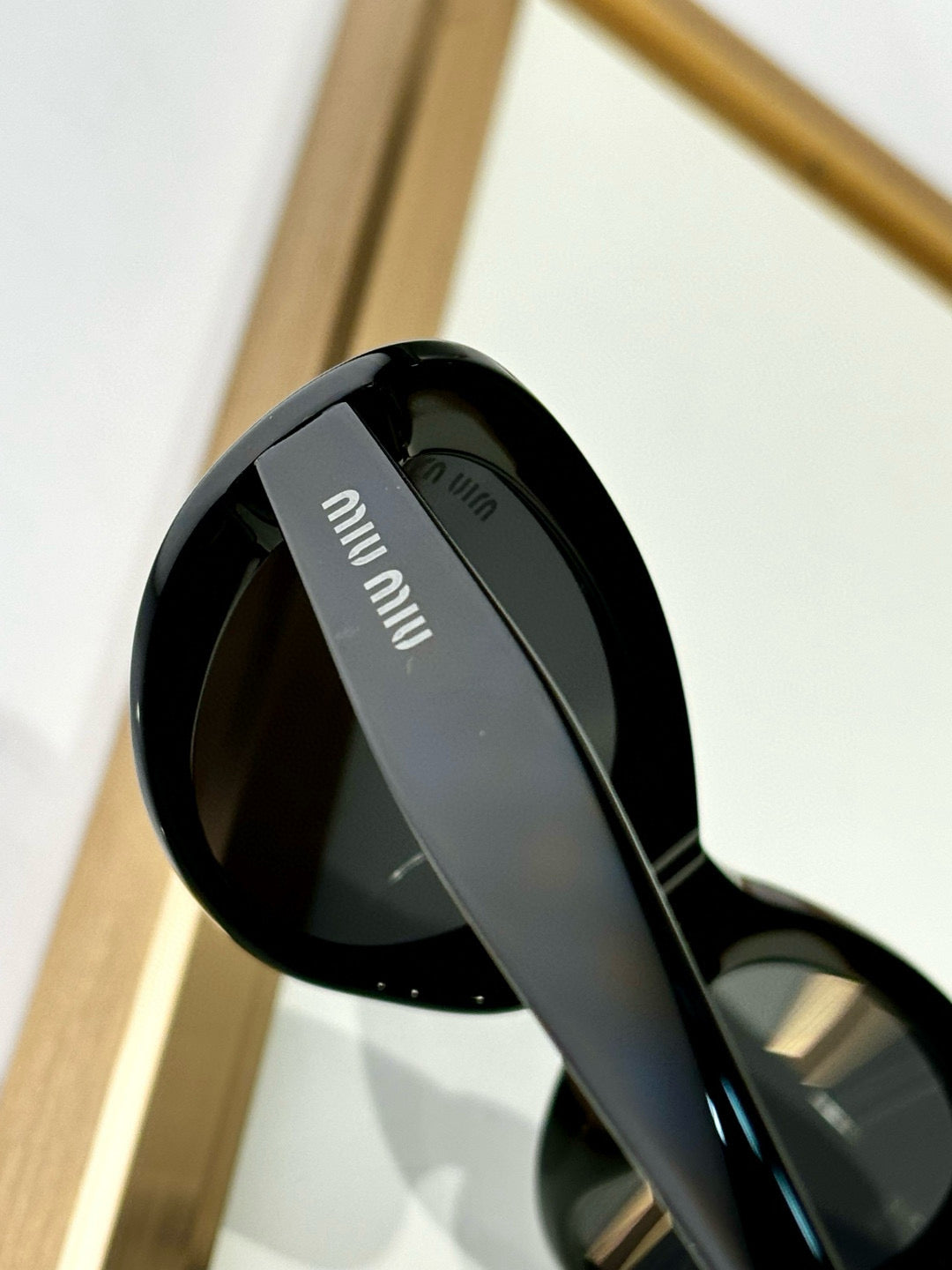 MIU M SUNGLASSES