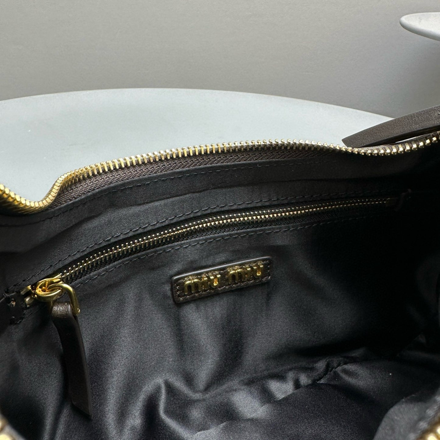 MIU M POCKET NAPPA LEATHER BAG
