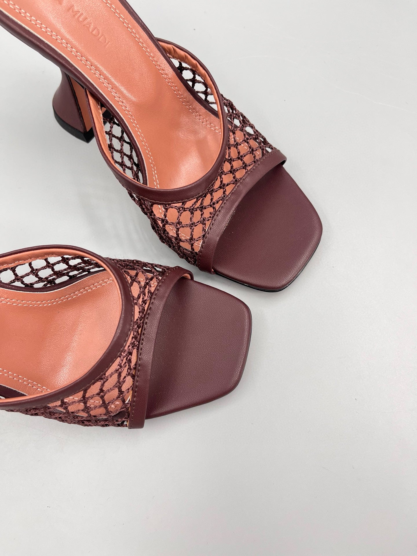 AMINA M HEELS