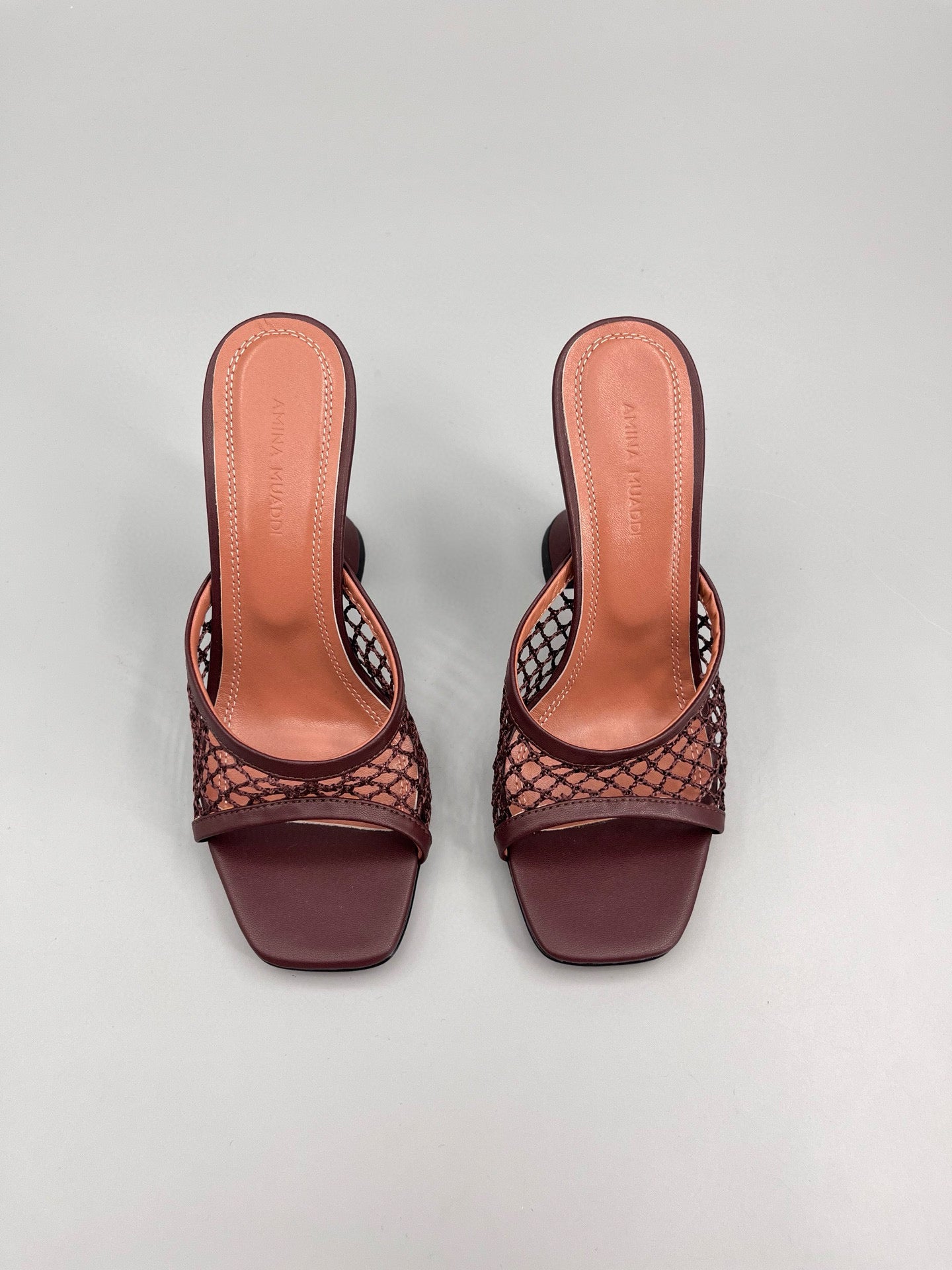 AMINA M HEELS
