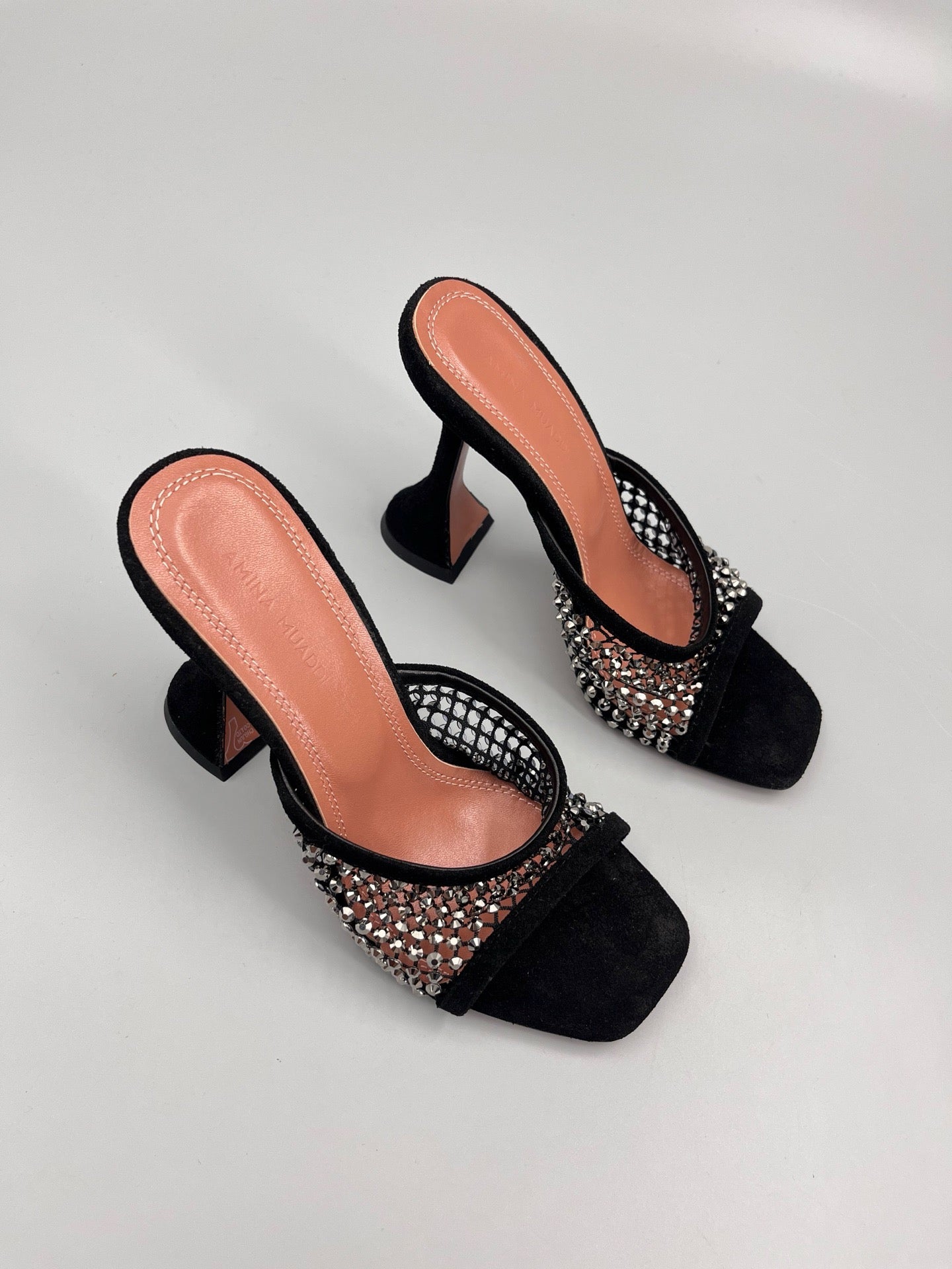 AMINA M HEELS