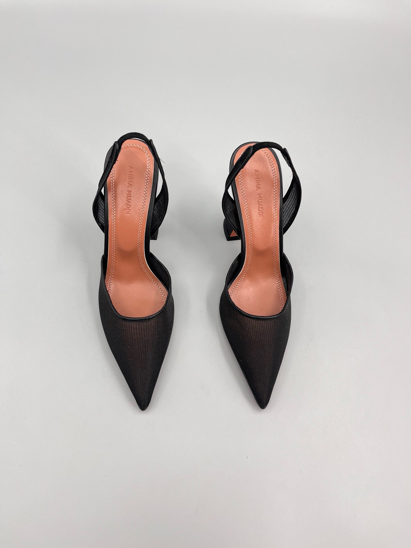 AMINA M HEELS